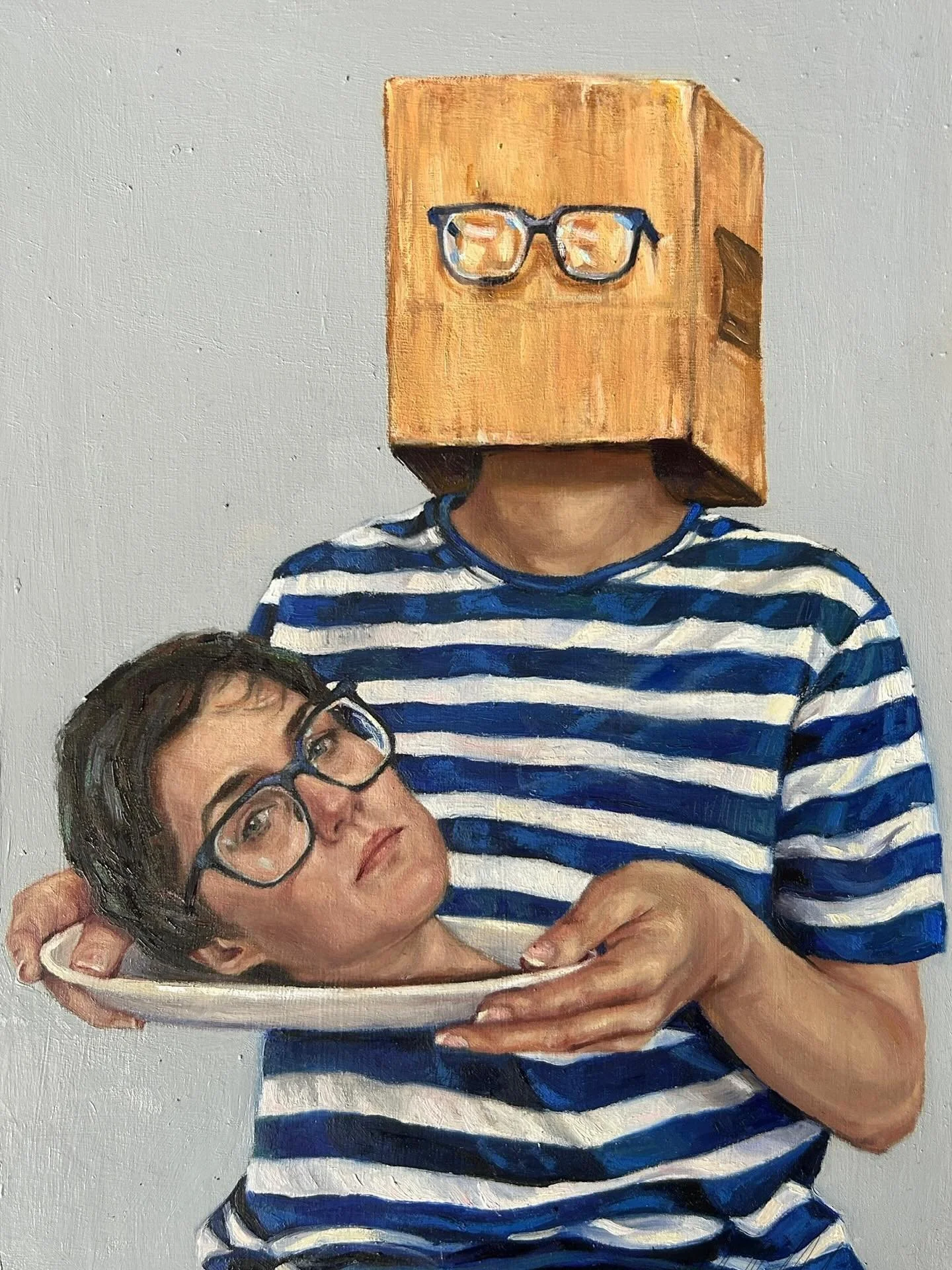 This is part of my Invisible Artist series , the cardboard box represents my art , in this imagining I have taken ideas from history of art, hopefully you can see it. The central figure holds my head on a plate it&rsquo;s a playful piece looking at h