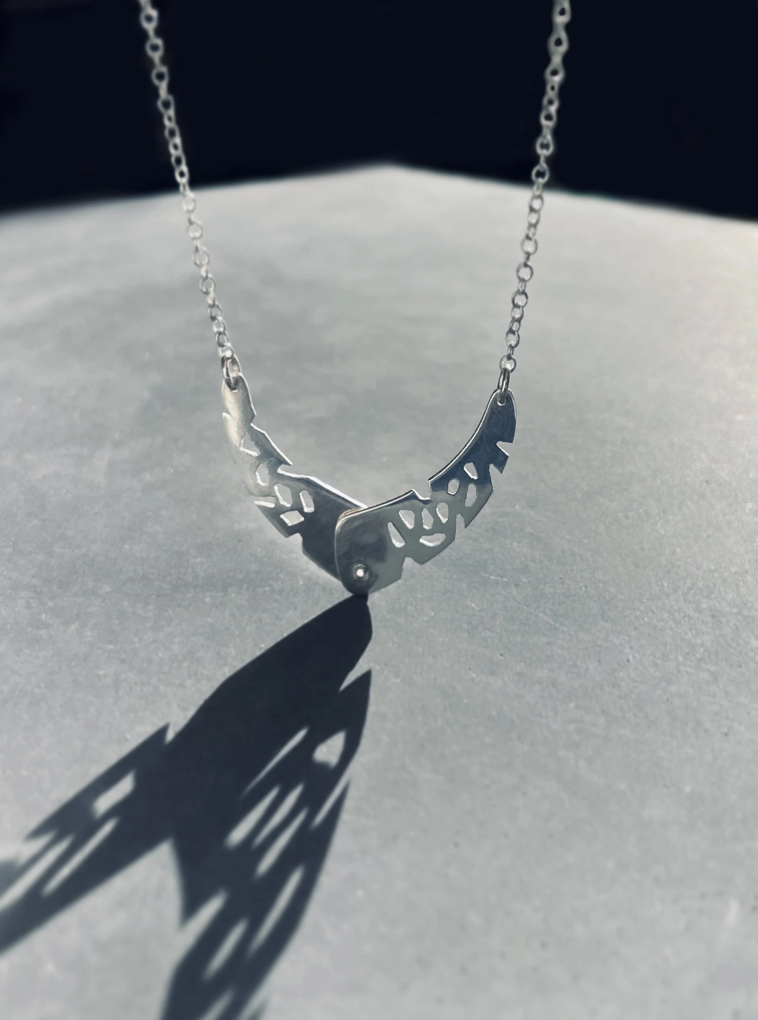 Rivet necklace close up shadow closed Lindsay McDonagh copy.jpg