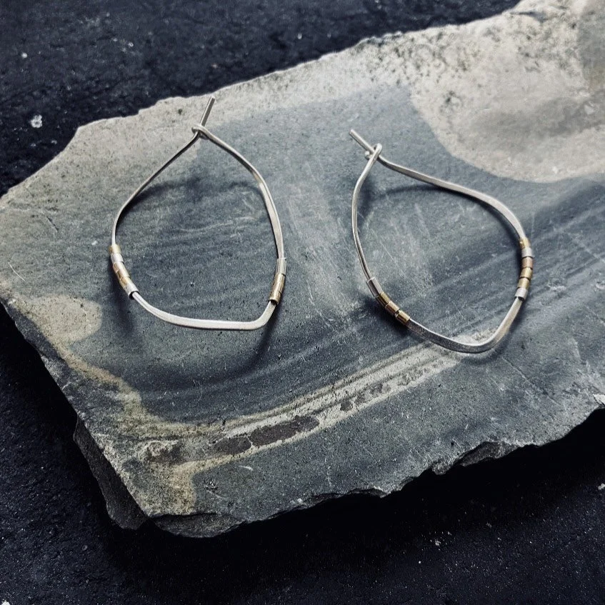 Silver wonky hoops Lindsay McDonagh.jpeg