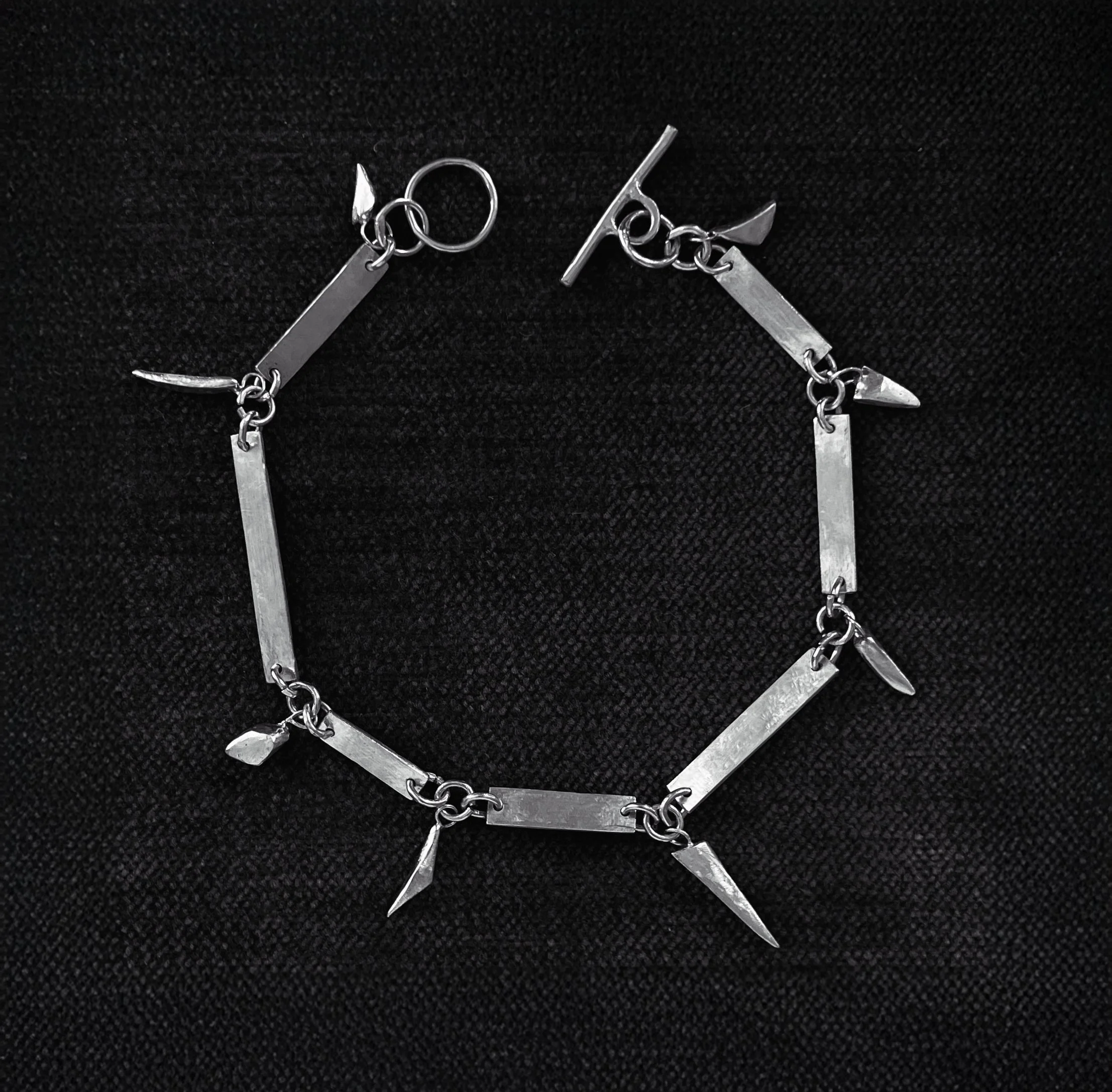 Silver charm bracelet Lindsay McDonagh.jpeg