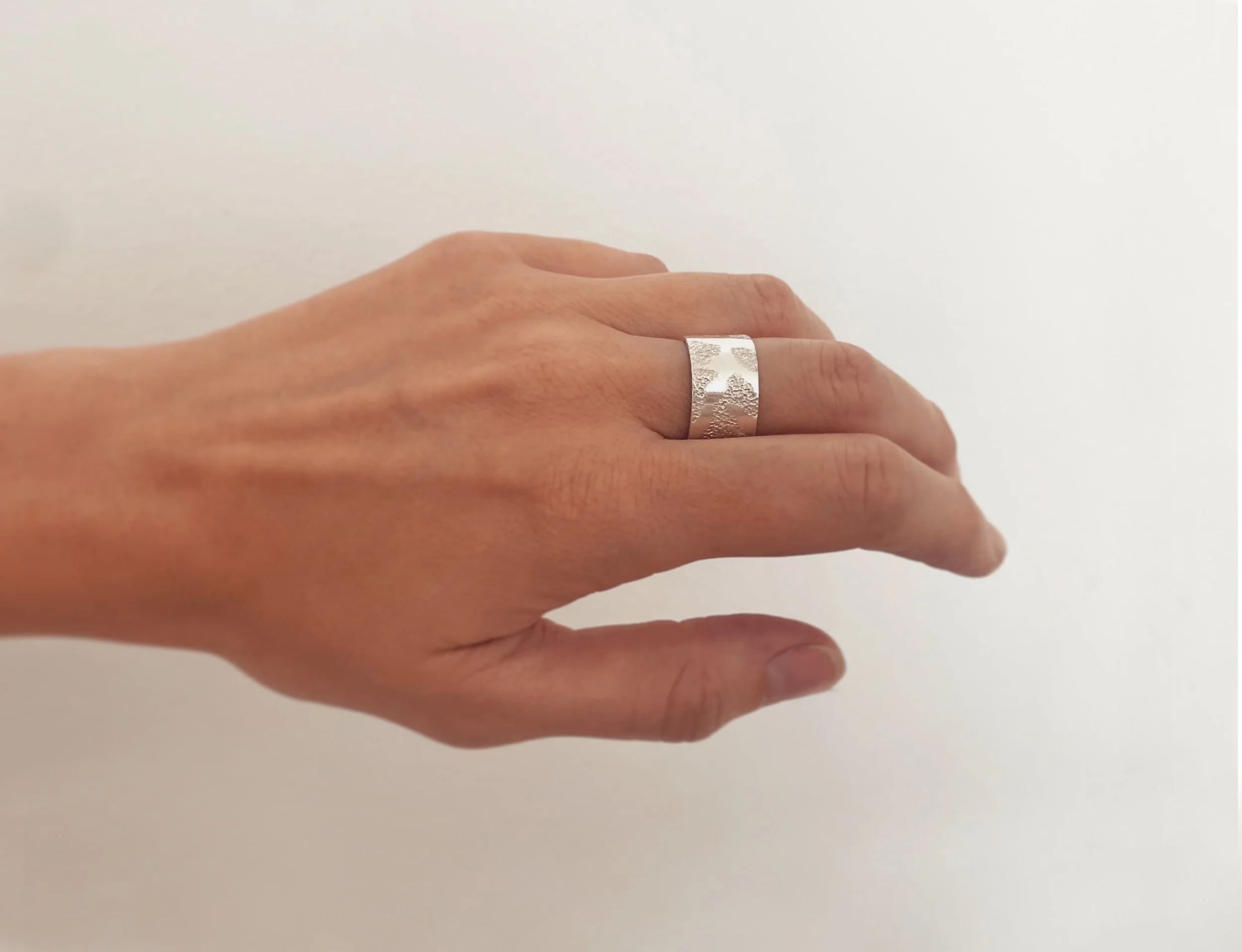 Botanical textured ring worn Lindsay McDonagh.jpeg