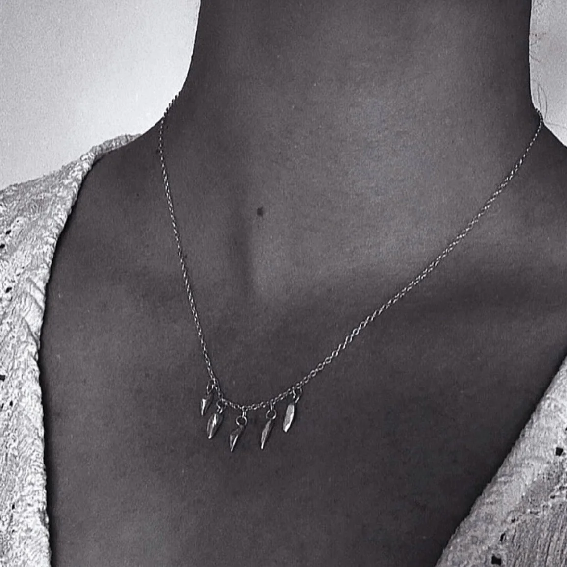 Solid Silver and gold charm necklace (1) Lindsay McDonag.jpg