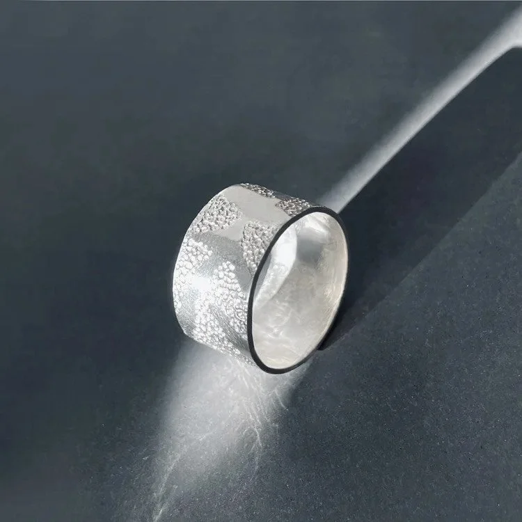 Botanical textured ring Lindsay McDonagh.jpeg