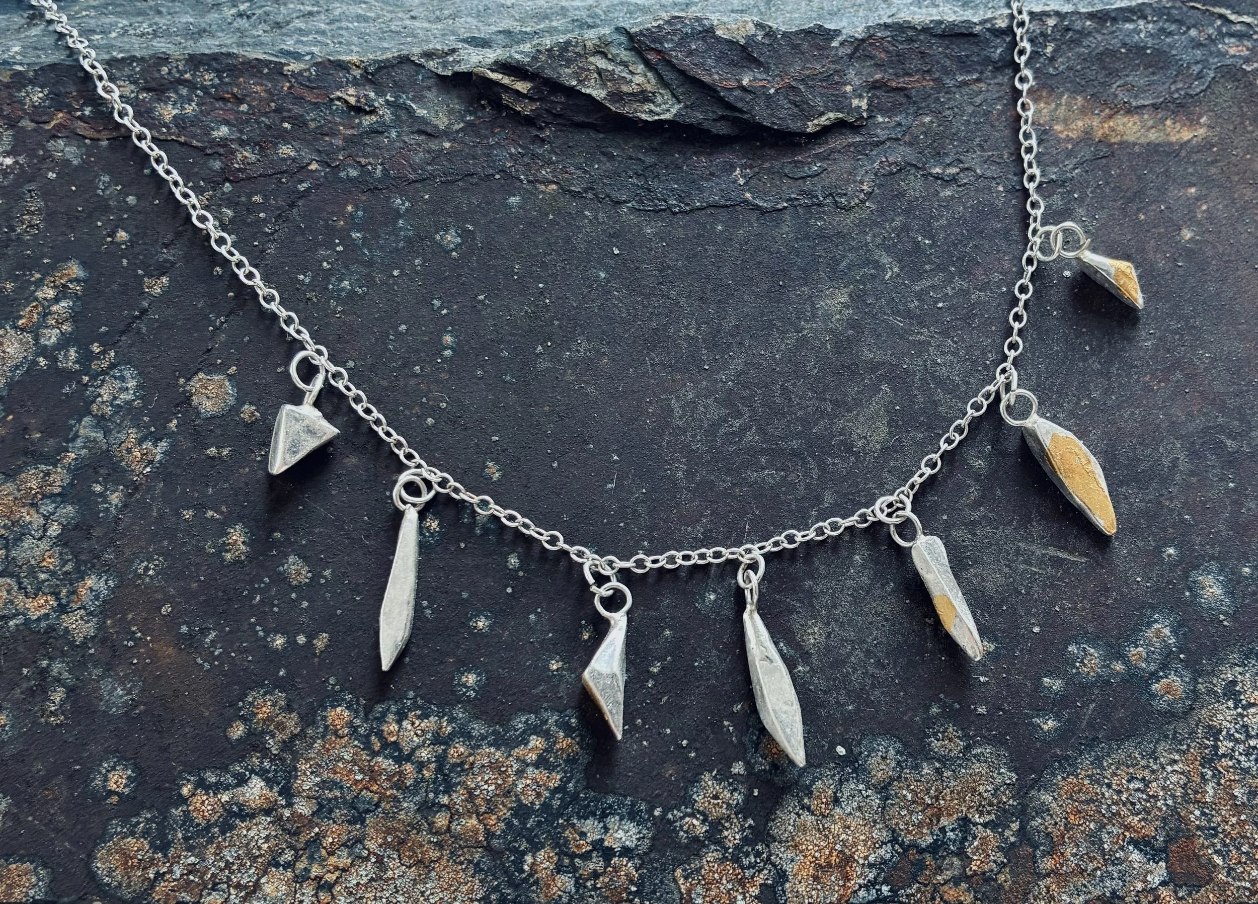 Silver and gold charm necklace (2) Lindsay McDonagh.jpg