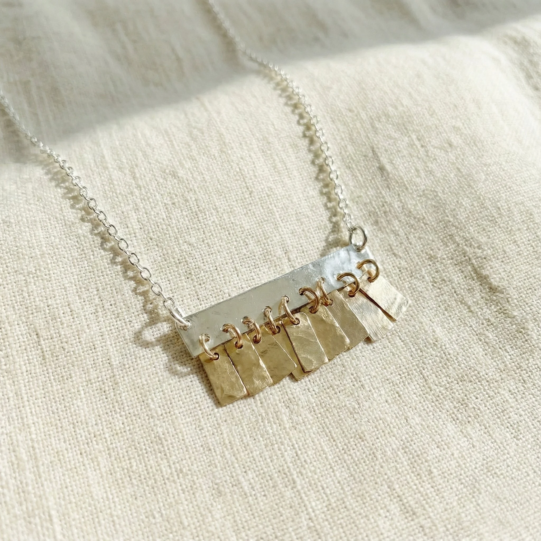 Silver bar with goldnecklace Lindsay McDonagh.jpg