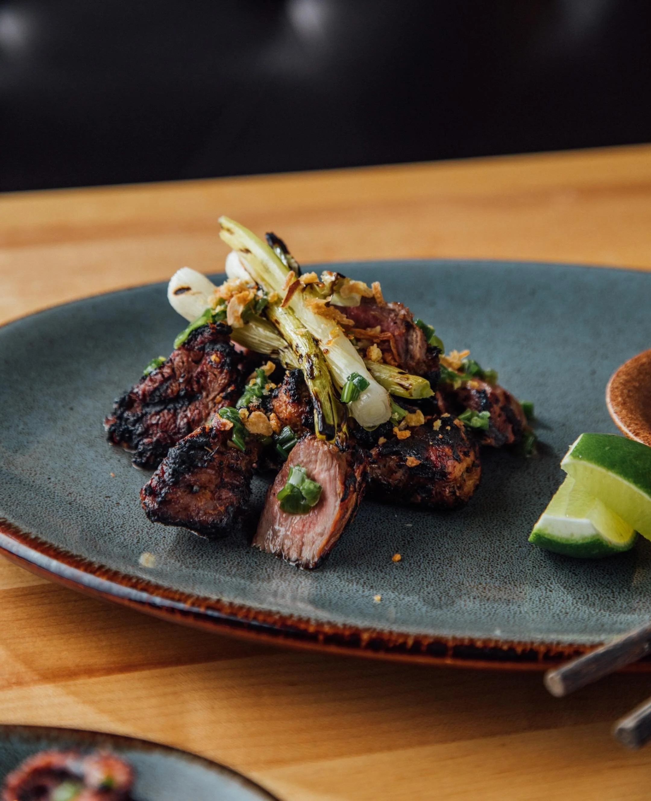 The routine: Sizzle, squeeze, dip, repeat. 🥩🍋&zwj;🟩✨
Grilled Wagyu fresh off our clay pot grills. The only thing better than the marbling is that perfect lime-and-seasoned-salt finish!

#chicagofoodie #grillmaster #musttry