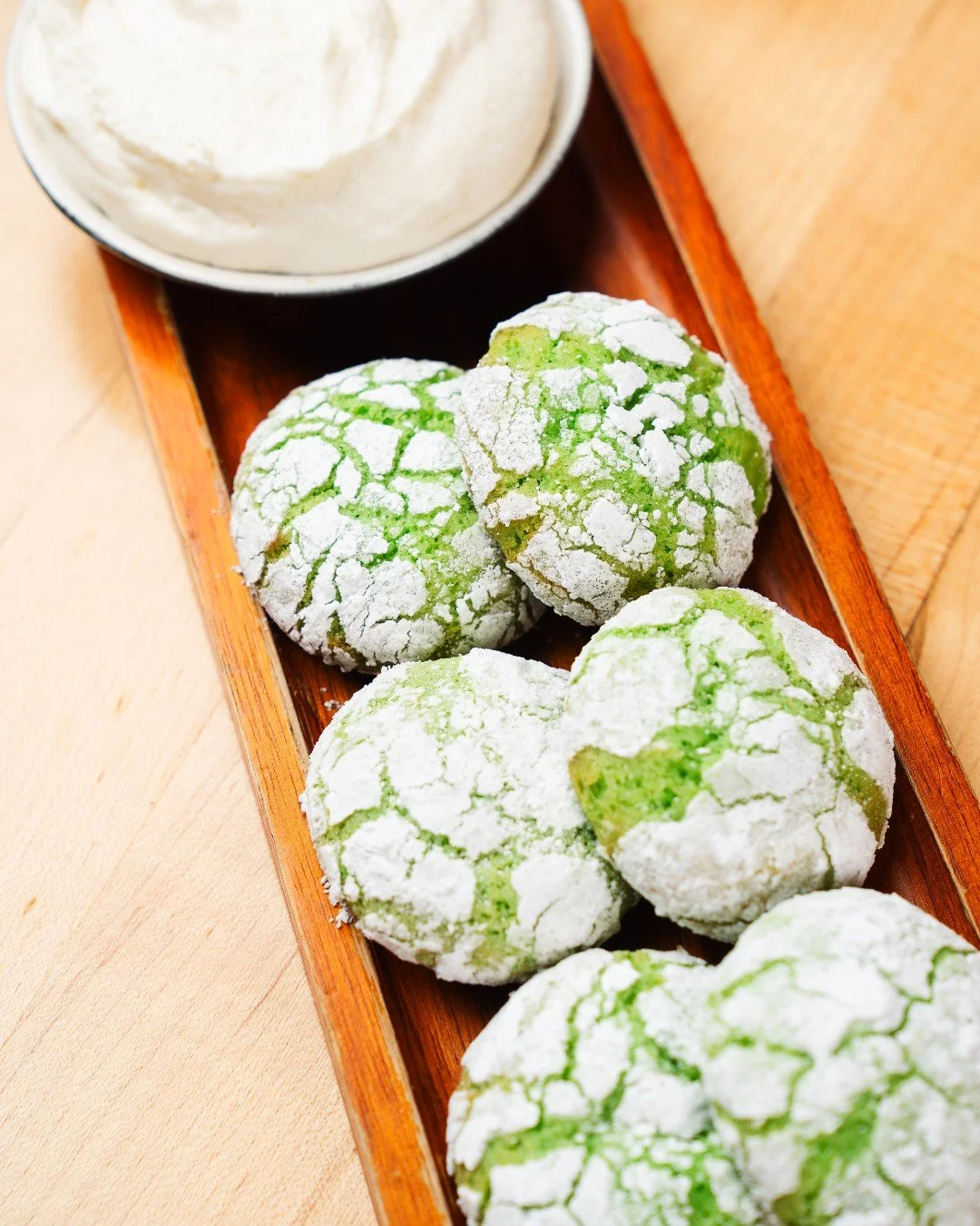Decadent + sweet, our Pandan Crinkle Cookies with whipped young coconut mousse are the perfect ending to your meal.

#cookies #dessert #dessertgram #vietnamesefood #chicagorestaurants #pilsenchicago #infatuationchi