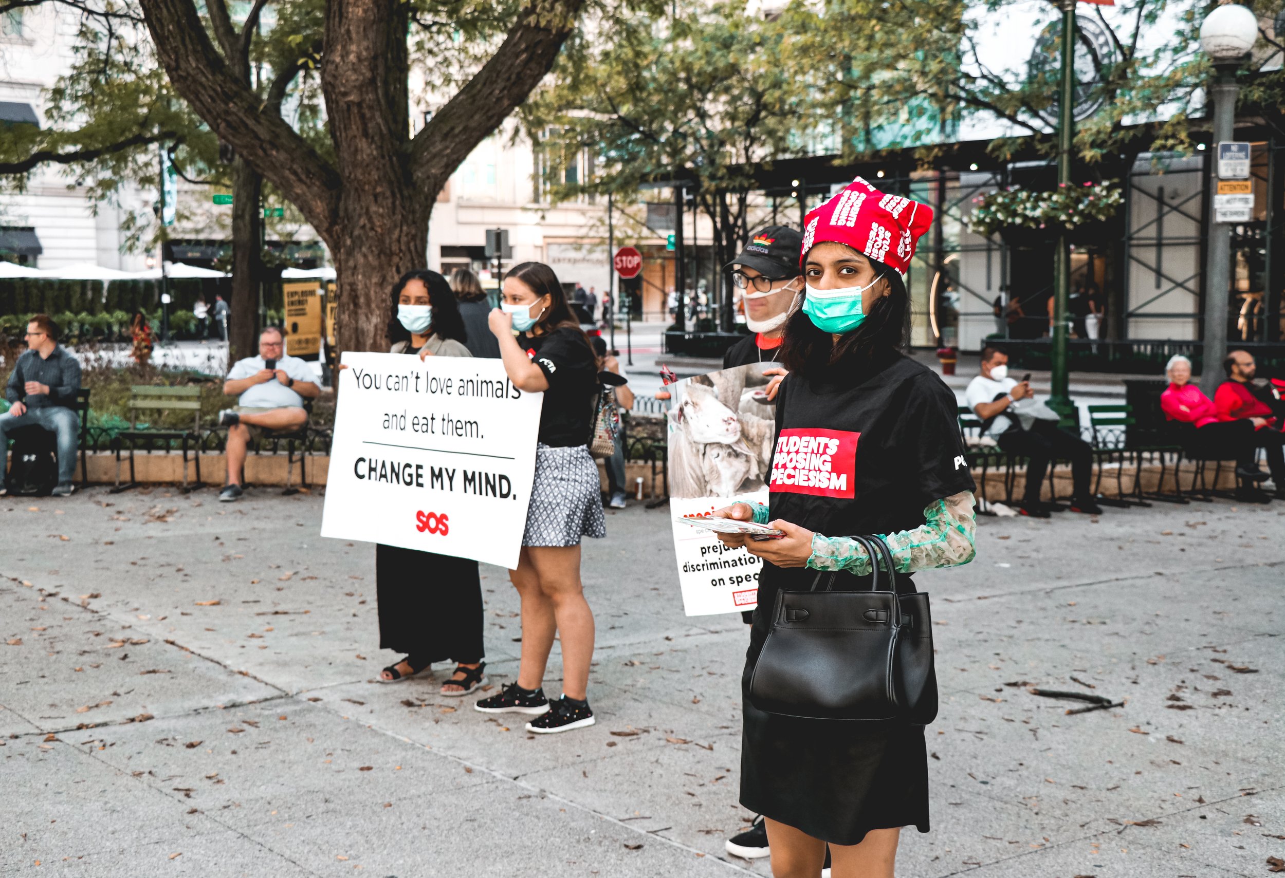 As activists stand with signs and hand out pamphlets with their slogan “End Speciesism” they express their thoughts on the issue. “We should stop eating animals because the future of the planet depends on it; its a huge contributor to climate change,
