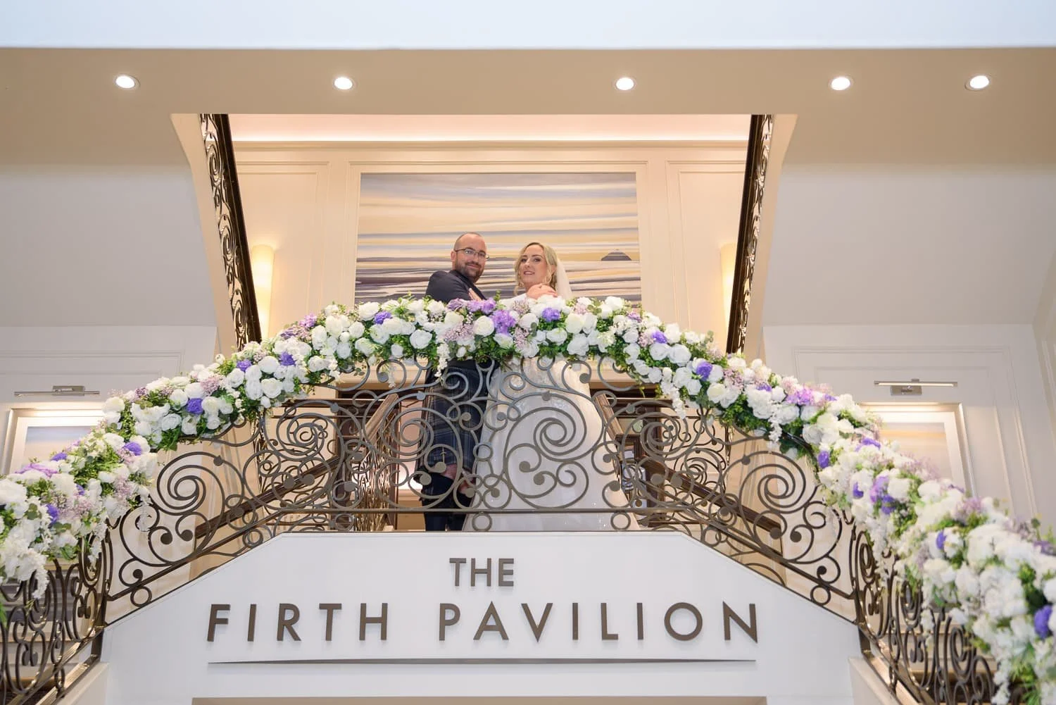 Romantic indoor wedding portrait of bride and groom at Seamill Hydro Hotel in Ayrshire.