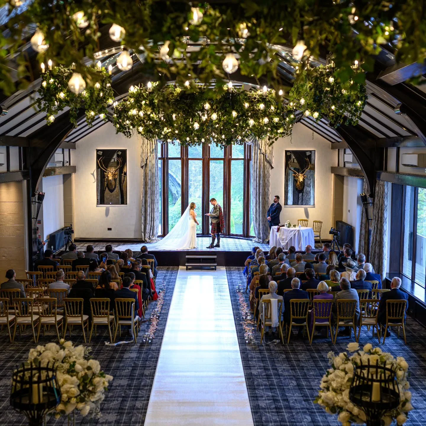 Taylor &amp; Jessica 

A beautiful ceremony at the famous brig o'doon. I love getting this kind of shots. Shows the stunning ballroom.

Venue - @brigodoonhouse1827
Photographer - @thomasmccabephotography_
Videography - @lm_videography 
Celebrant- @da