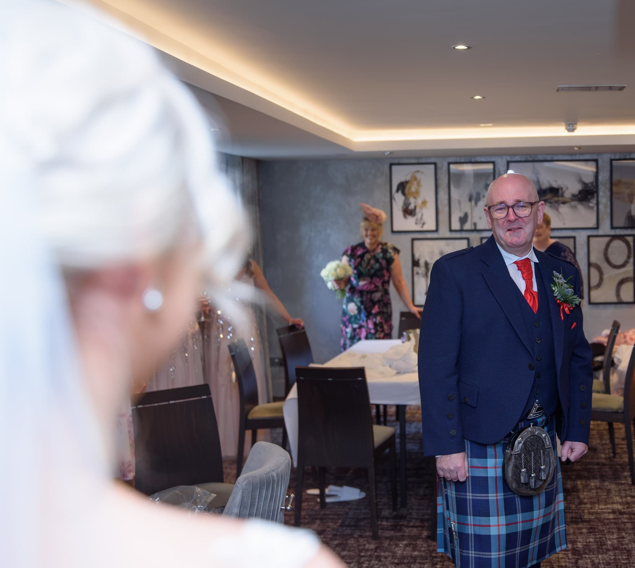 Emotional father seeing his daughter for the first time on her wedding morning at the Carlton Hotel in Prestwick