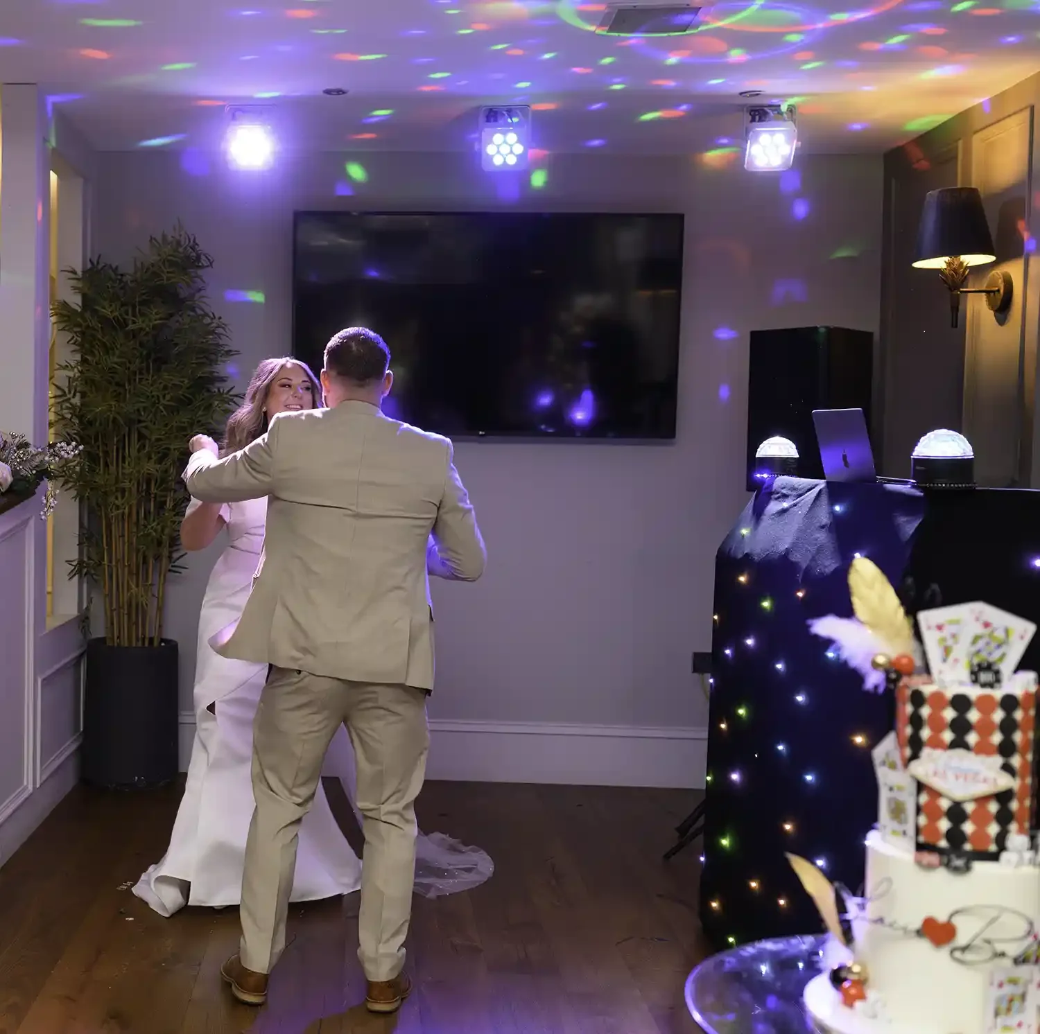 Bride and groom sharing their first dance during their wedding reception at The Stravaig Ayr