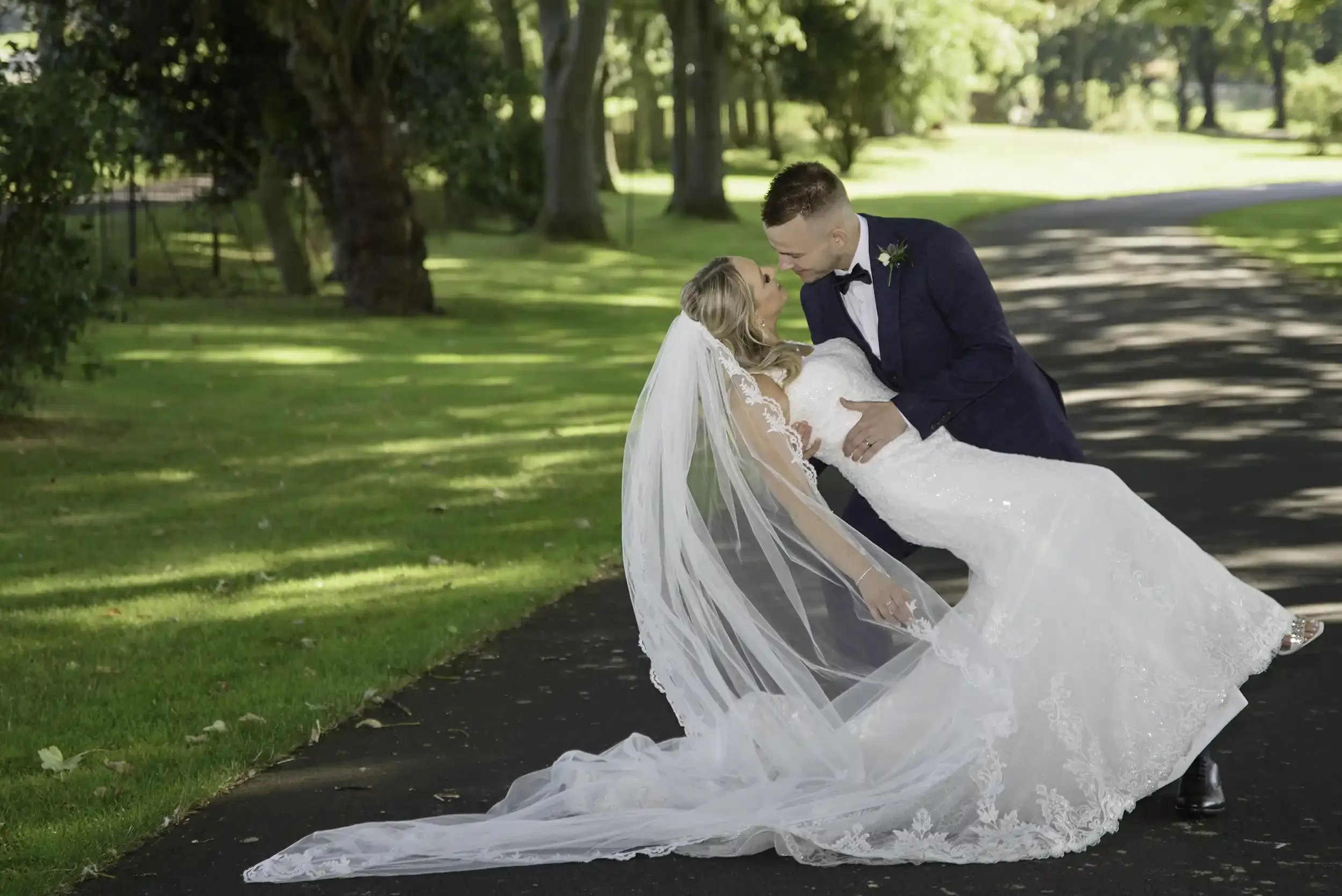 Bride and groom portrait at Western House Hotel wedding in Ayr Ayrshire with flowing veil