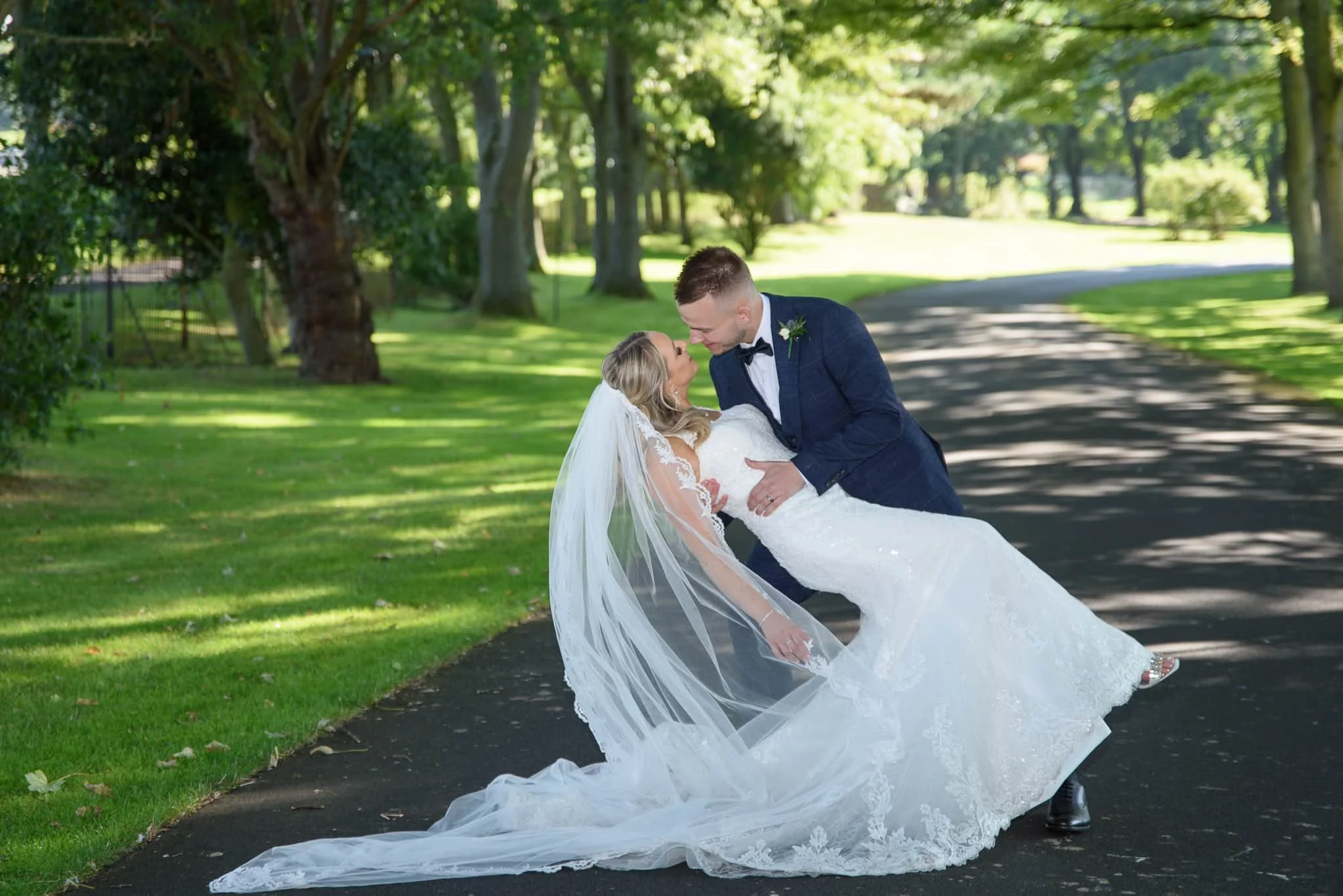 Bride and groom portrait at Western House Hotel wedding in Ayr Ayrshire with flowing veil