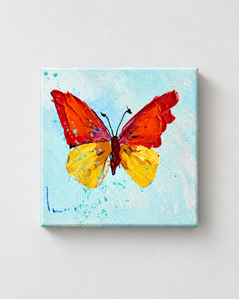 Centered+butterfly+canvas+on+gray+wall.png