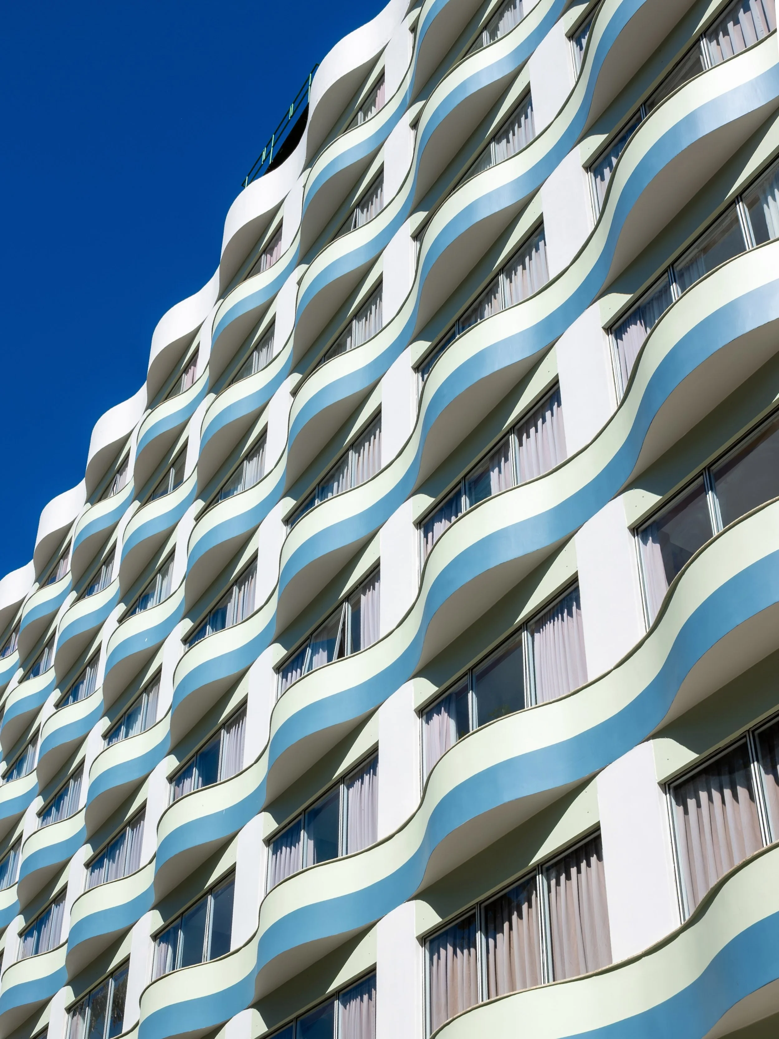 The Vila Gal&eacute; Salvador was engineered and developed by the regional Brazilian construction company Lebram Construtora in 2002.
Even though the building was built in 2002, its design borrows elements from Brazil&rsquo;s midcentury architectural