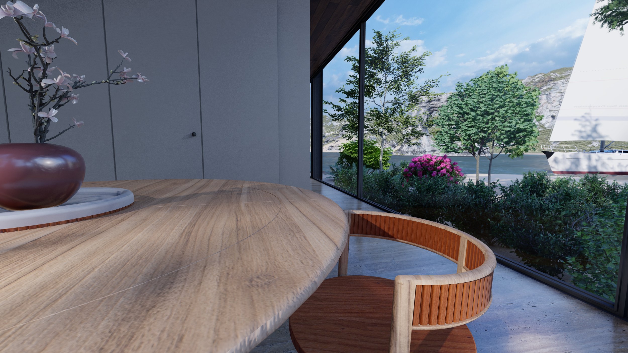 Sala moderna con mesa de madera, silla, florero con flores y ventana grande que muestra un paisaje con árboles y un mar de fondo.