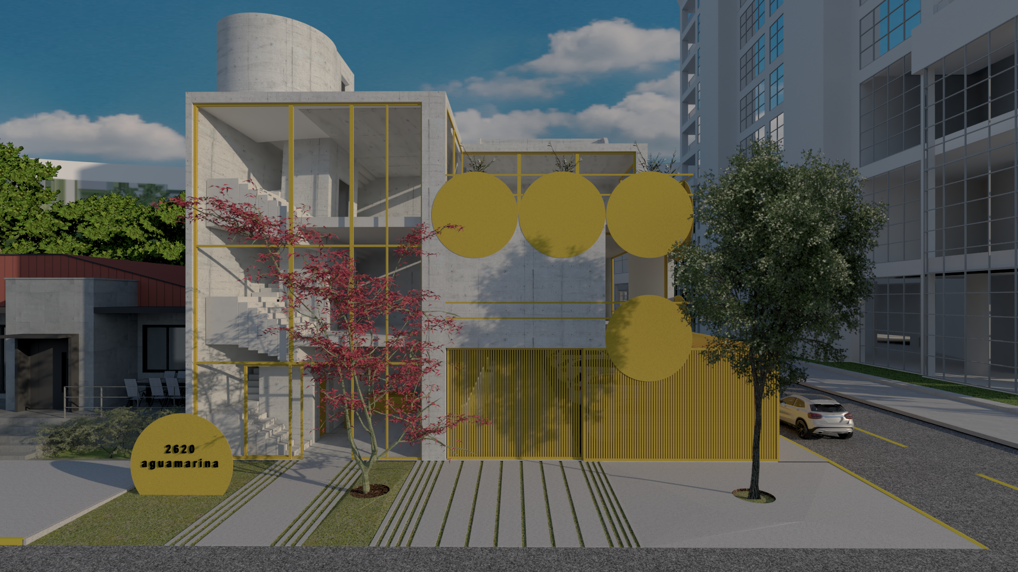 Edificio moderno con estructura de concreto y elementos amarillos, rodeado de árboles. En el frente hay una placa que dice "2620 aguamarina". Se observa una calle y un automóvil estacionado a la derecha.