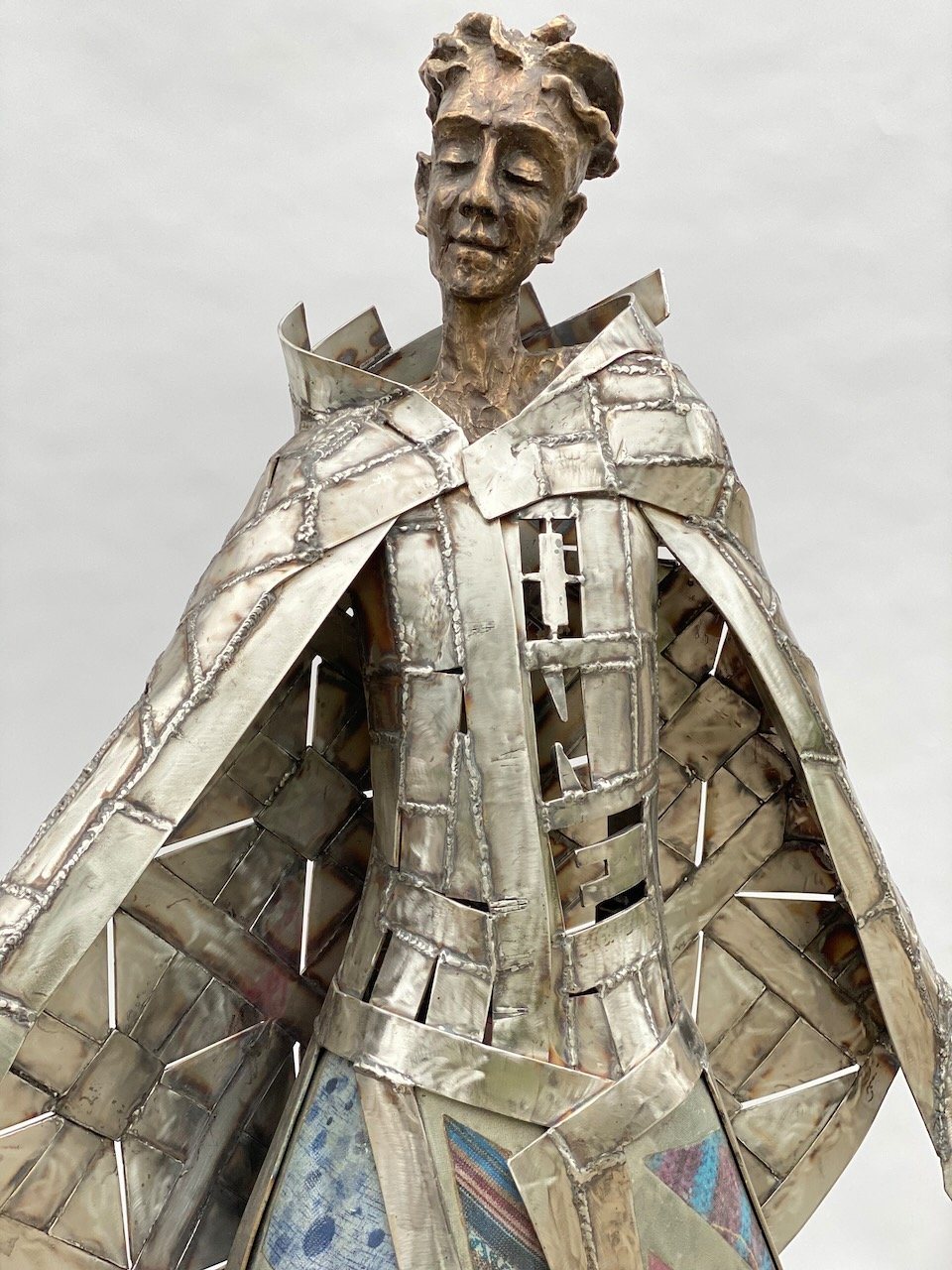 Out of Many... sculpture commission for Willmar MN. A public art project that had community donations of fabrics that represented them and their families.