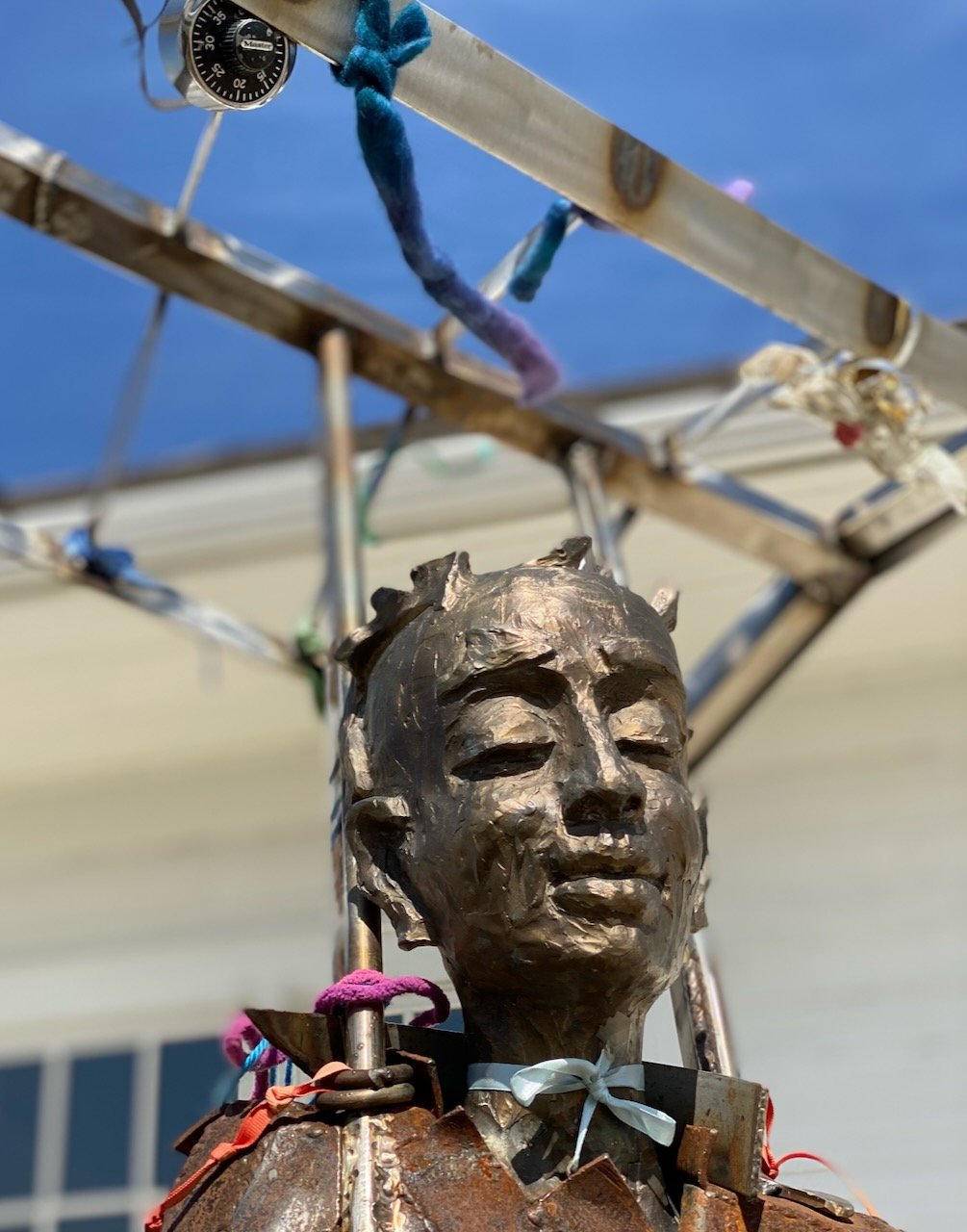 Keeper of Memories sculpture memorial. This sculpture was placed for the community of Hutchinson, MN to remember their loved ones. Detail with donations.
