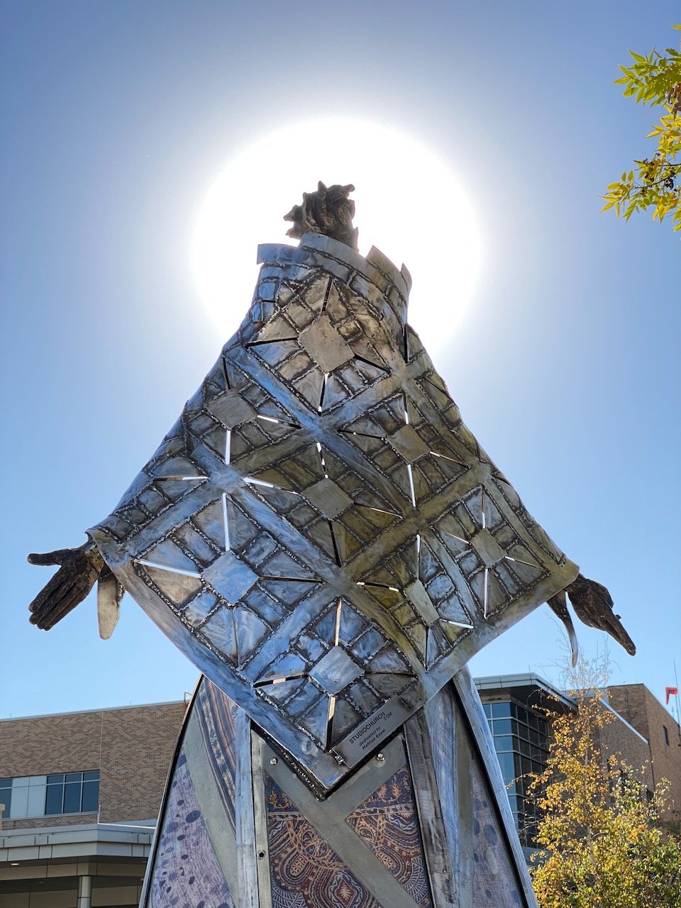 Out of Many... sculpture commission for Willmar MN. A public art project that had community donations of fabrics that represented them and their families.