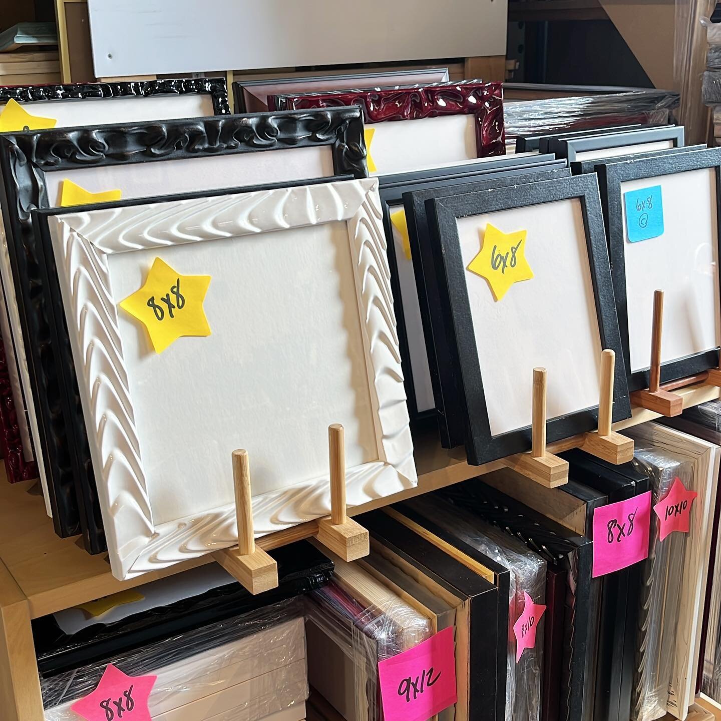 Tidying up the workspace. I&rsquo;m finally starting to display and inventory some of the @folkgraphis_frames @romamoulding discontinued frames that I ordered a while ago! Most of these get used up for my art shows but sometimes I have leftover stock