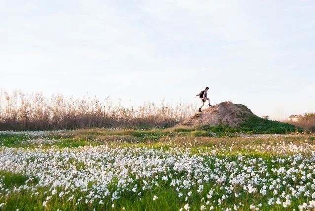 Person climbing hill