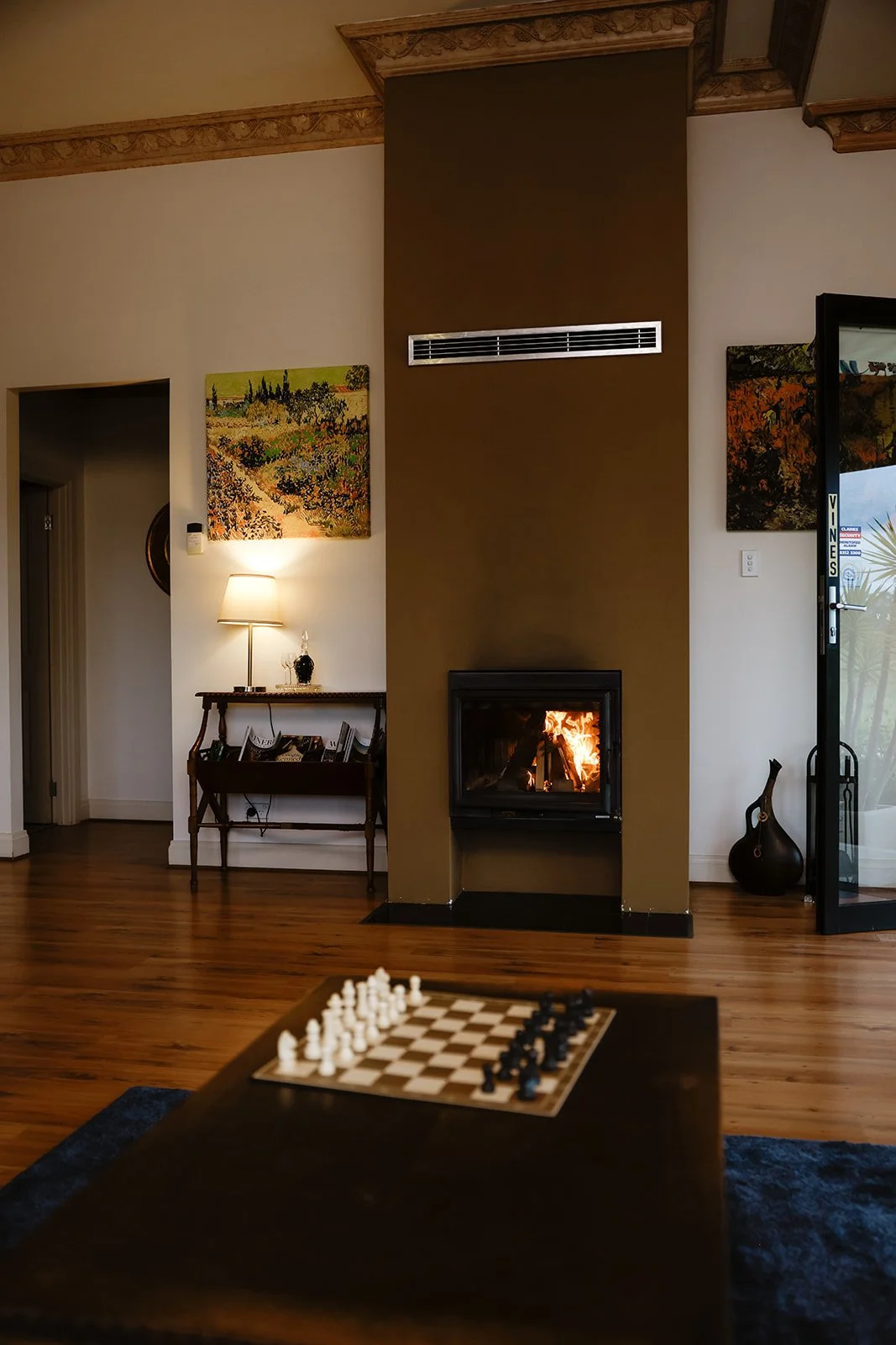 Lighting a fire at The Vines when staying Barossa Shiraz Estate