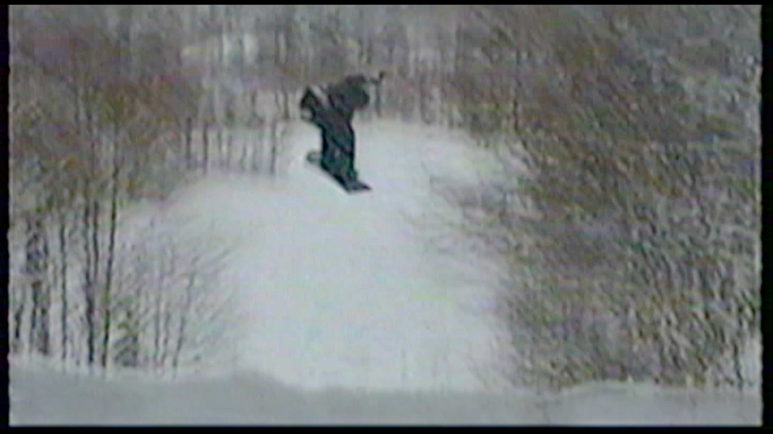 The Cannon jump. Whoever shot this (Mike Messenti, I think) has their back to the takeoff and what you see below is the landing. Built for distance with trees on each side, no satellite tricks! Open lot below is where we pulled in.