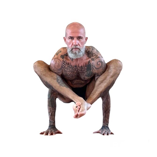 Jason Douglas Schramm of The Yoga Shala Rawai Phuket demonstrating Bhujapidasana.