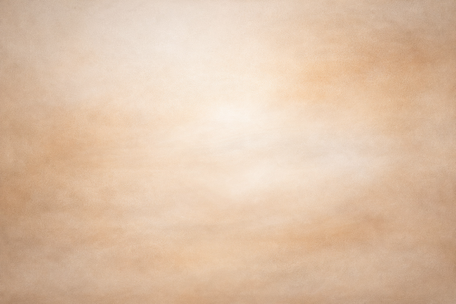 Blurry, beige and brown abstract background with no distinguishable objects