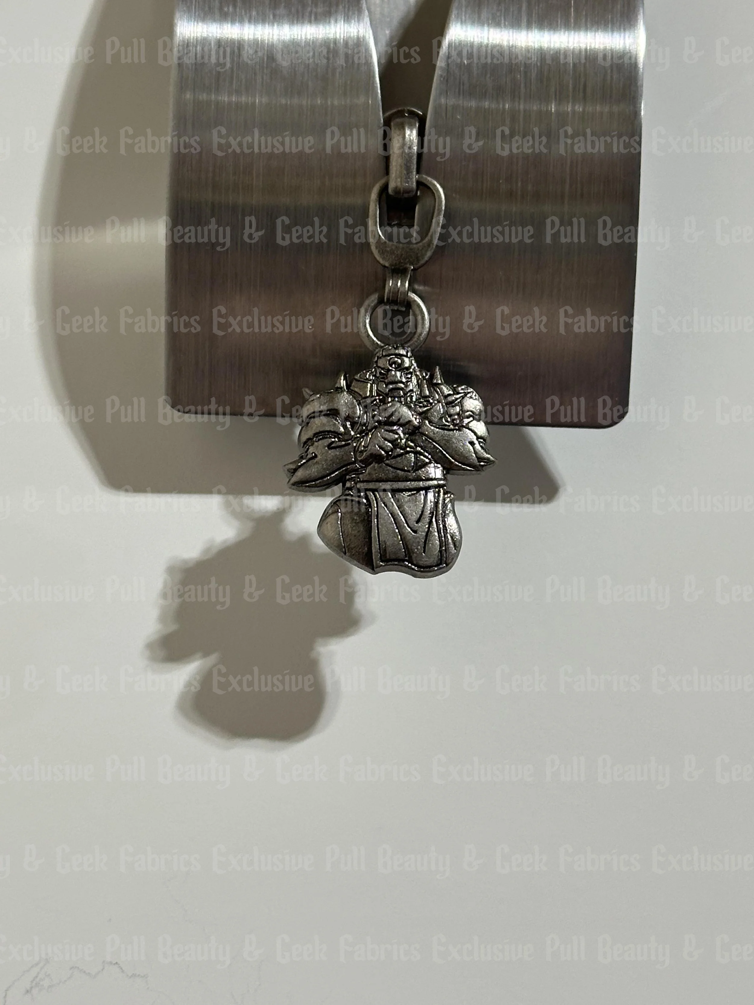 FMA #5 Zipper Pull - Retail