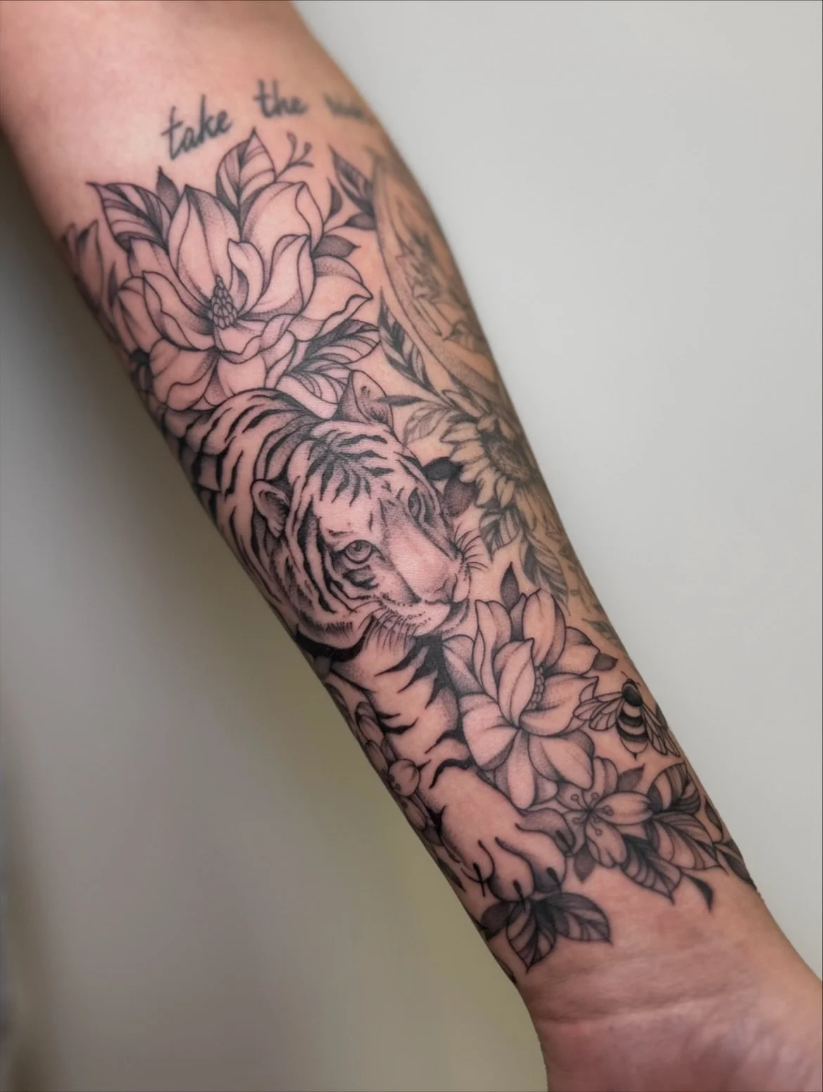 T I G E R + F L O R A L S

some magnolias, cherry blossoms &amp; tiger lilies. 
+ a little bumble bee! to finish off her forearm. 

this was the ultimate &ldquo;trust the process&rdquo; piece, as my rough sketch (in the last photo) was questionable. 