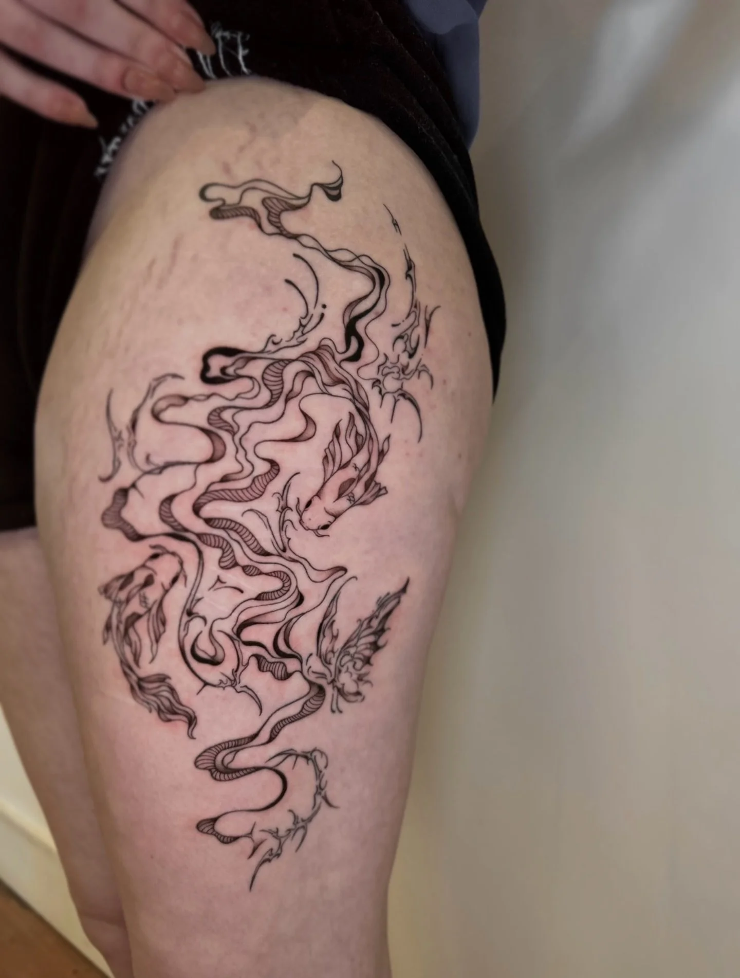 a b s t r a c t - i s h.

a couple of koi fish &amp; a butterfly, 
with a mix of flowy abstract work &amp; cybersigilism. 
(linework is all healed, shading is new!)

thanks for the trust maddie!