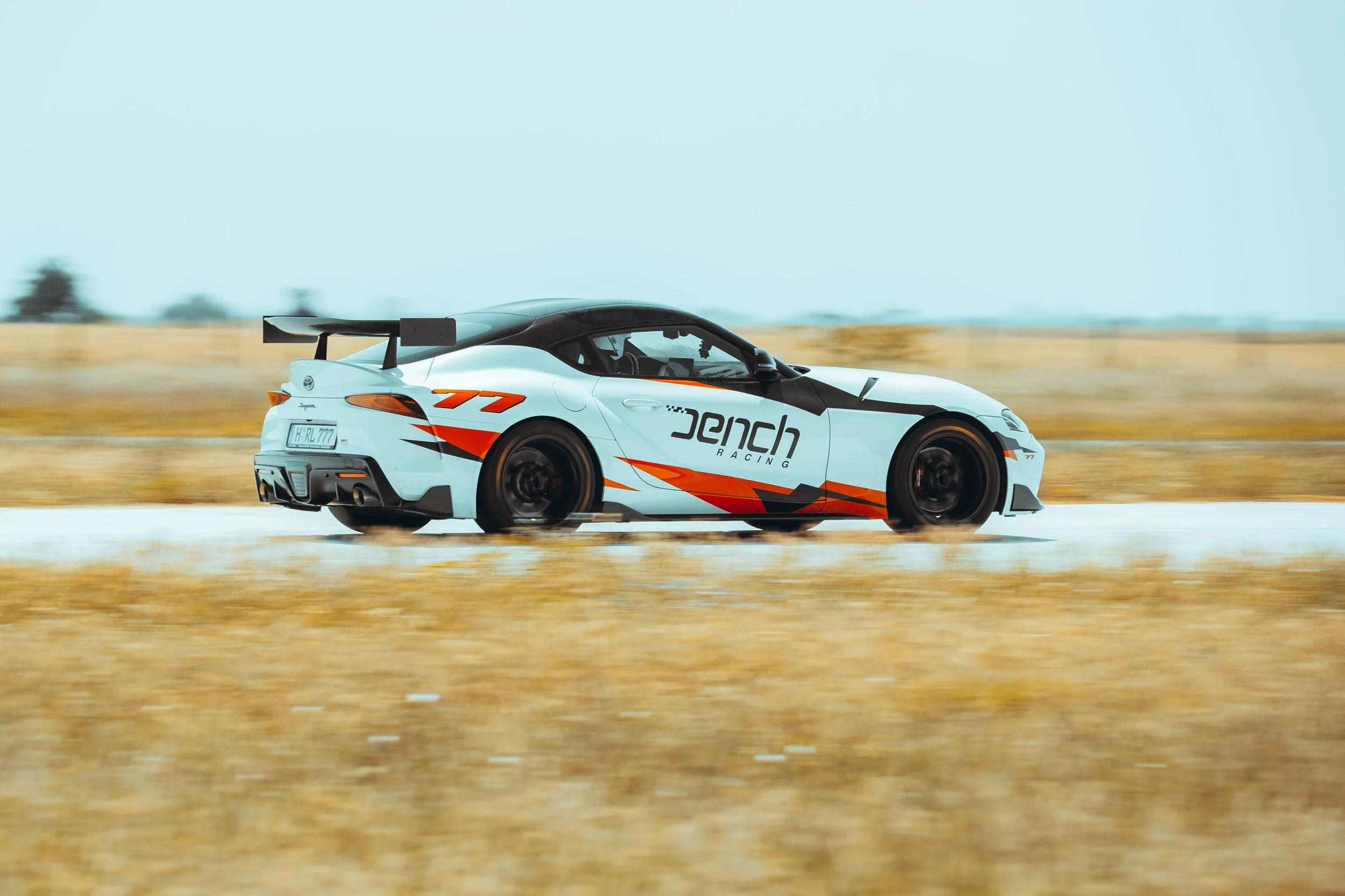Toyota Supra race car on race track