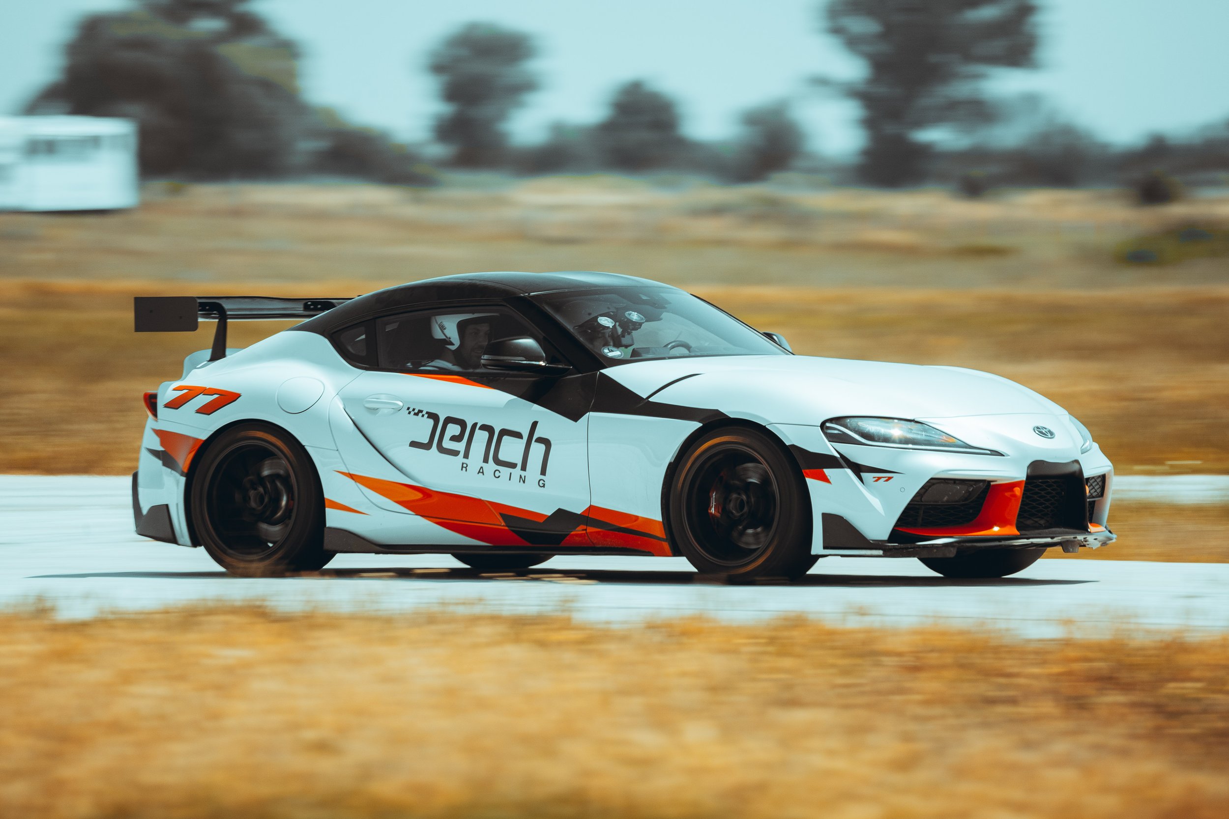 Toyota Supra race car on race track