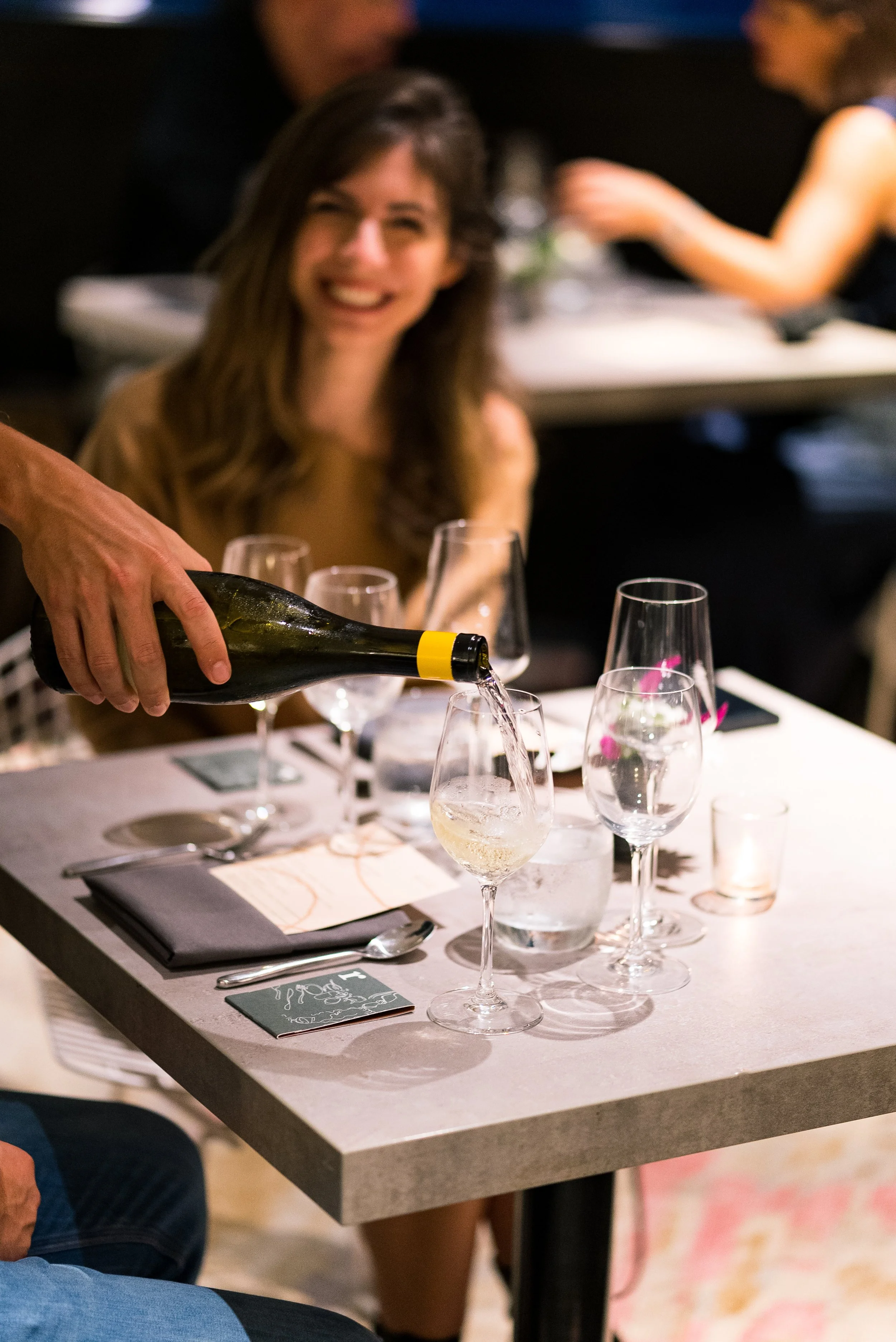 Midtown West Wine Pouring.jpg
