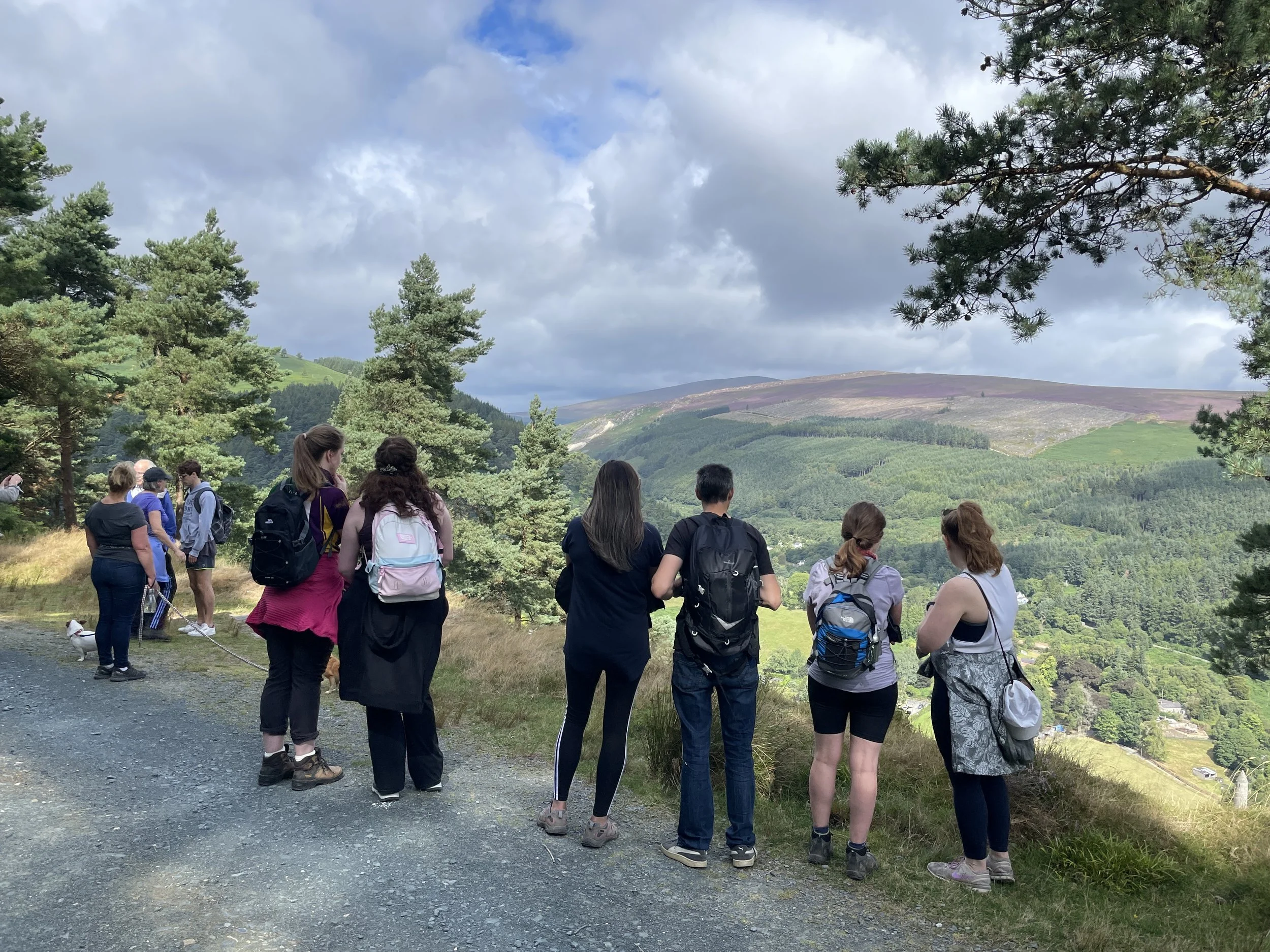 people looking over Glendalough