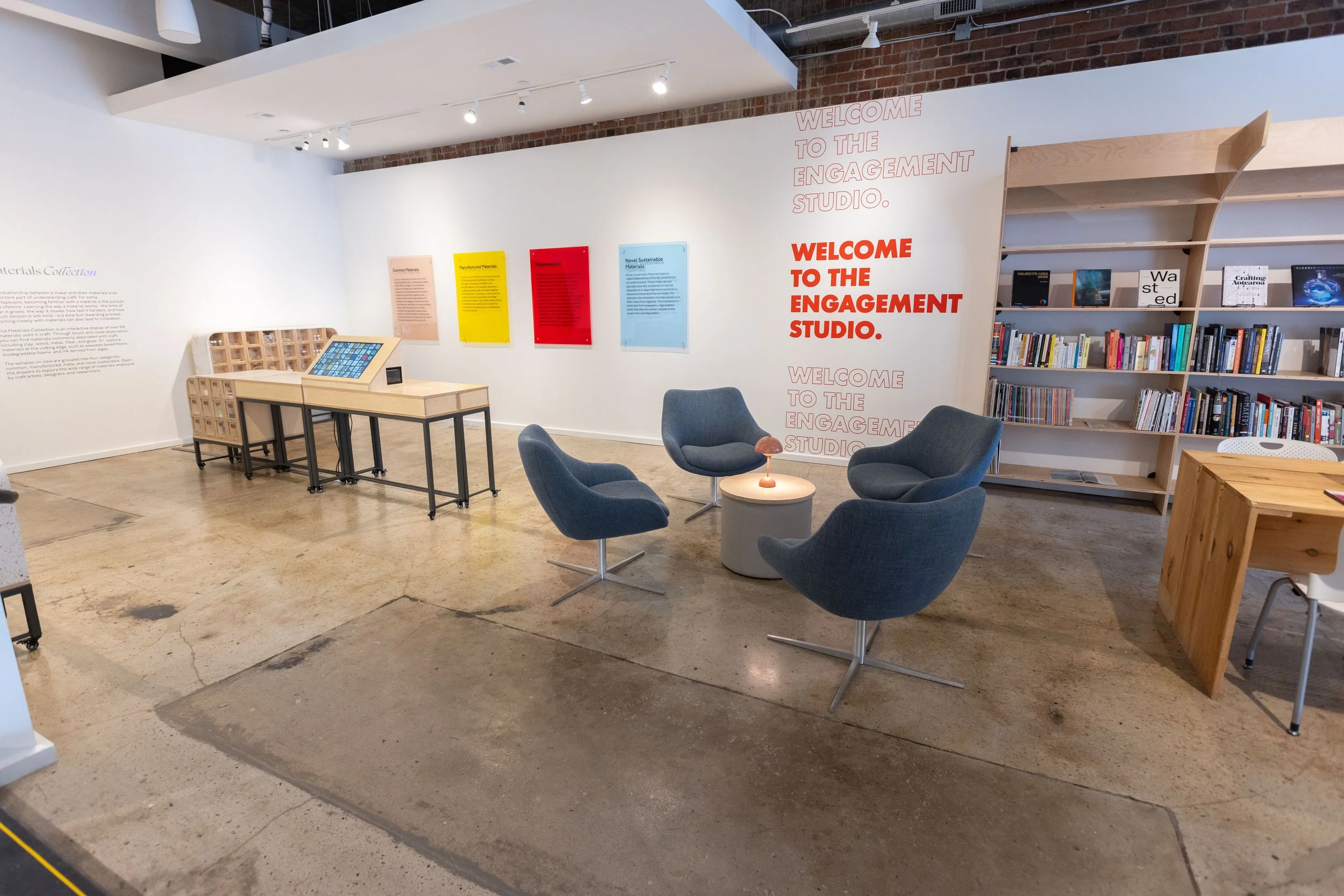 Engagement Studio at Center for Craft featuring the Materials  Collection, an interactive material archive with touchscreen catalog,  categorized material samples, and modular seating designed by Craftwork