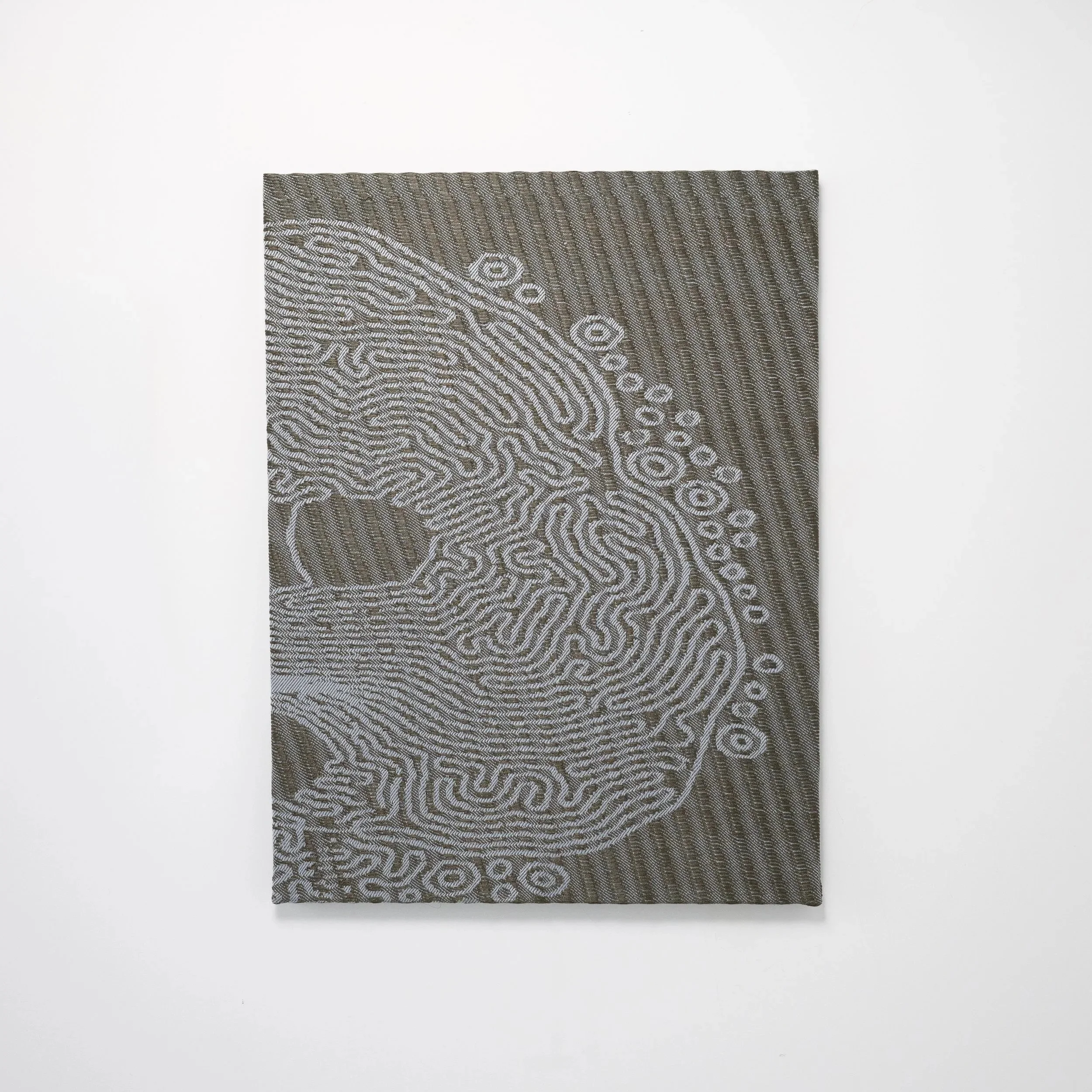 Detail of a Slow Medium woven panel in gray-green and light blue,  showing algorithmically generated lichen growth pattern by Craftwork