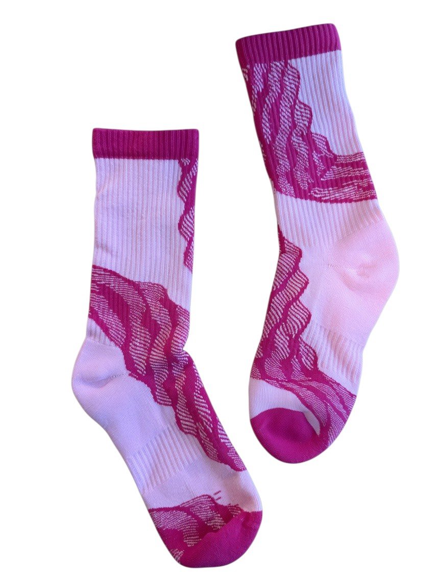 Echo Knits crew socks in magenta and white with wave-form knit pattern, flat lay product shot