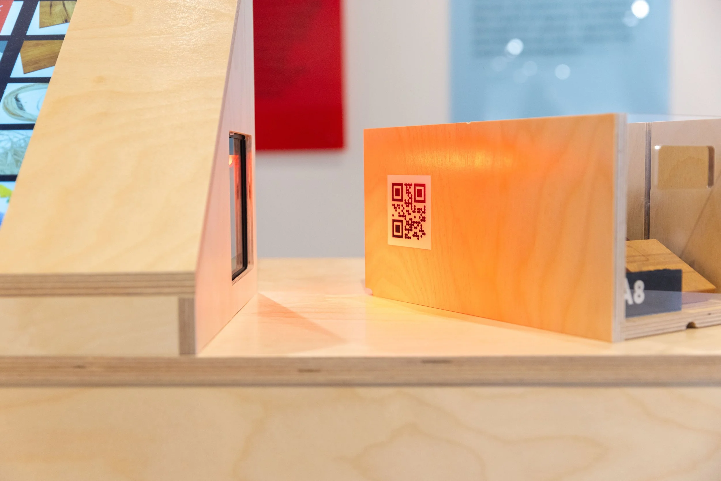 QR code on a wooden sample box linking to the Materials Collection's  digital catalog, Center for Craft