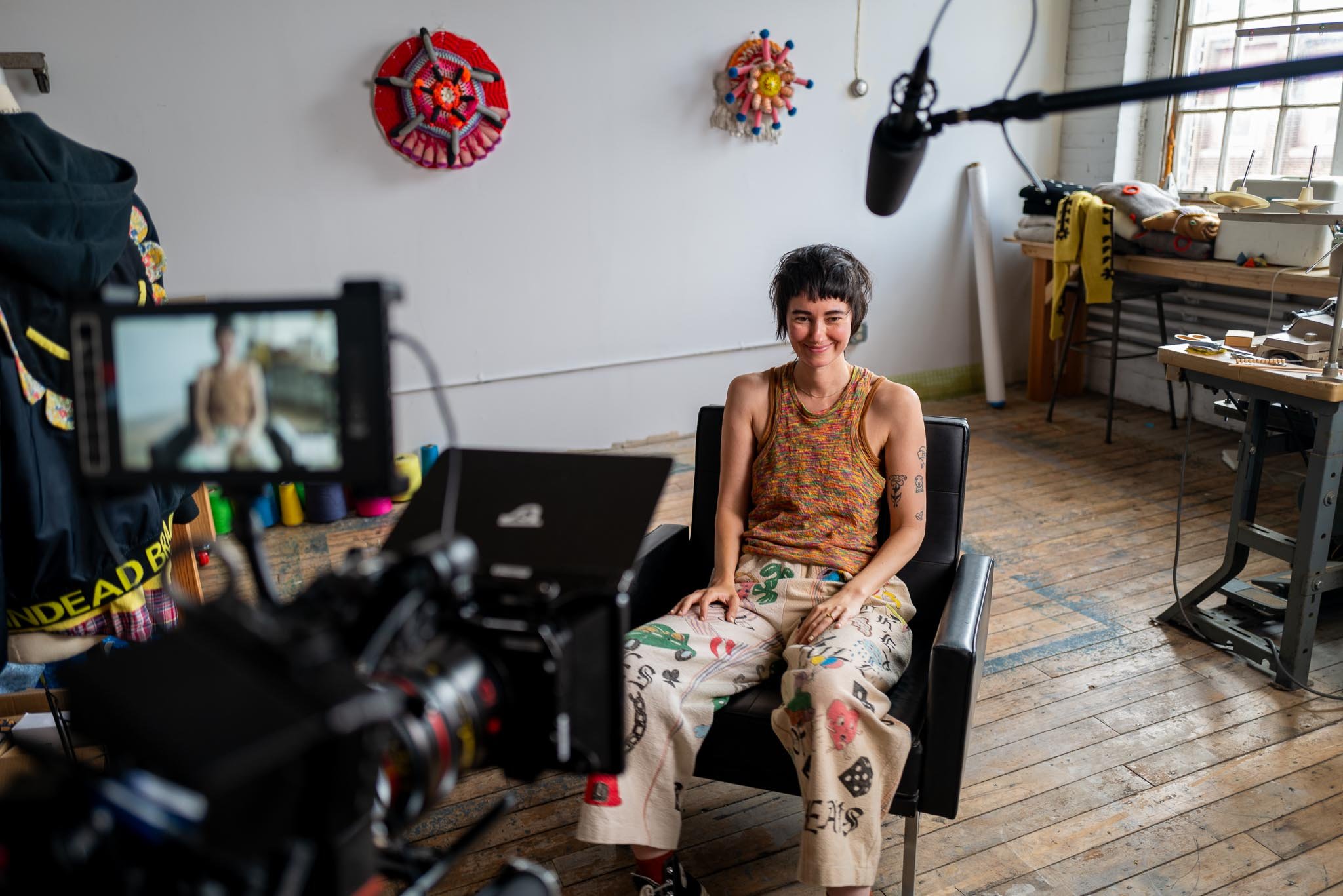 Lindsay Degen sits for her interview in her studio.