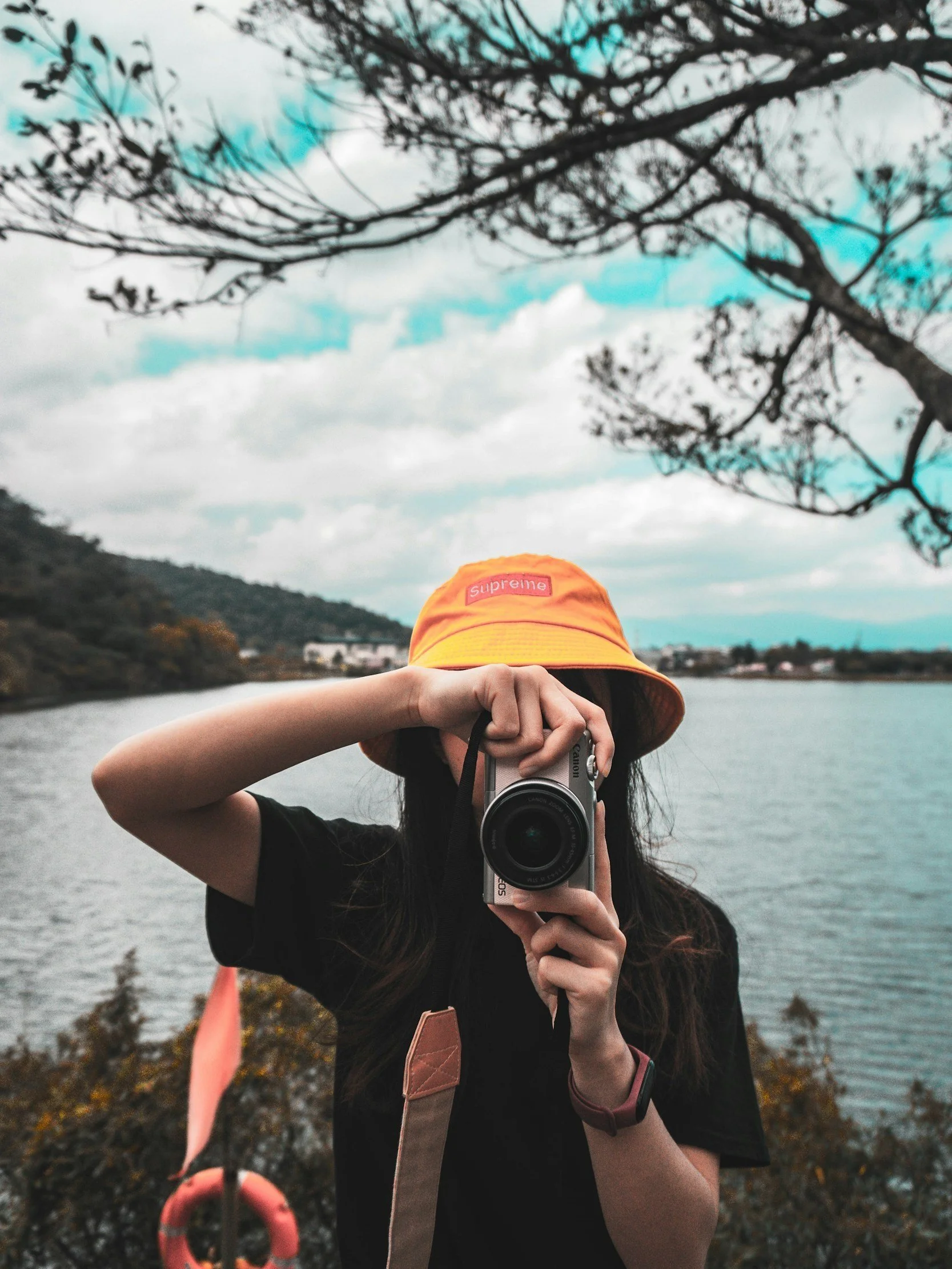 woman with a camera outdoors