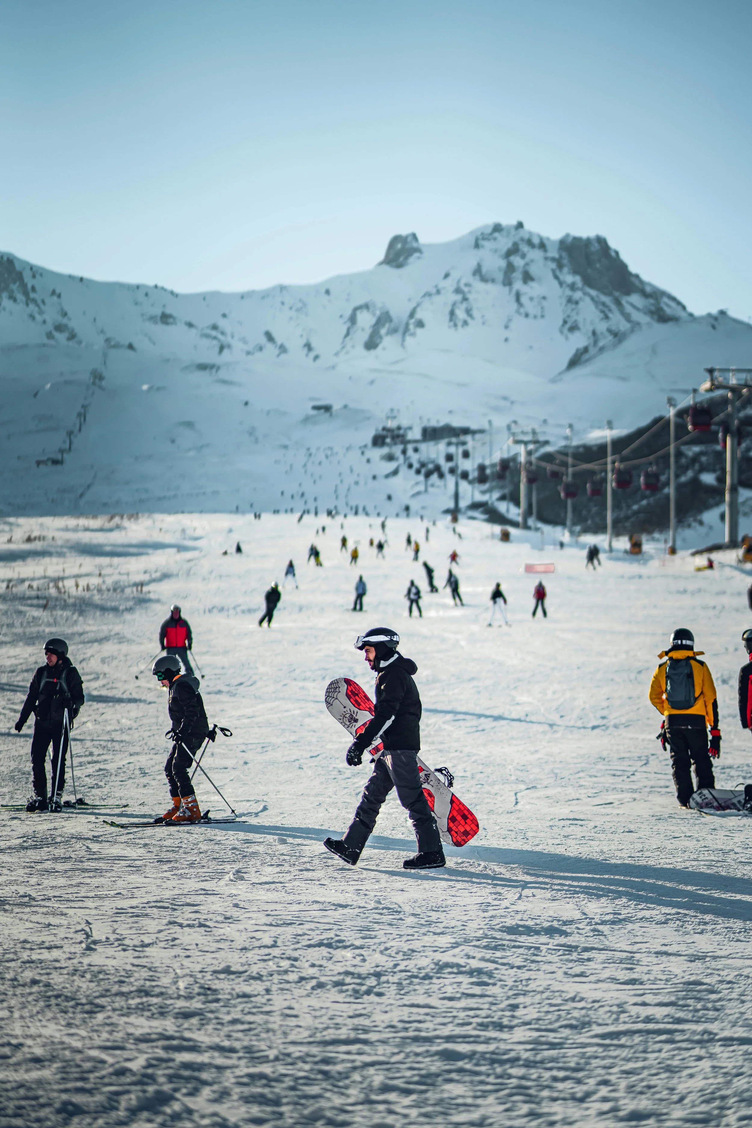 people skiing and snowboarding