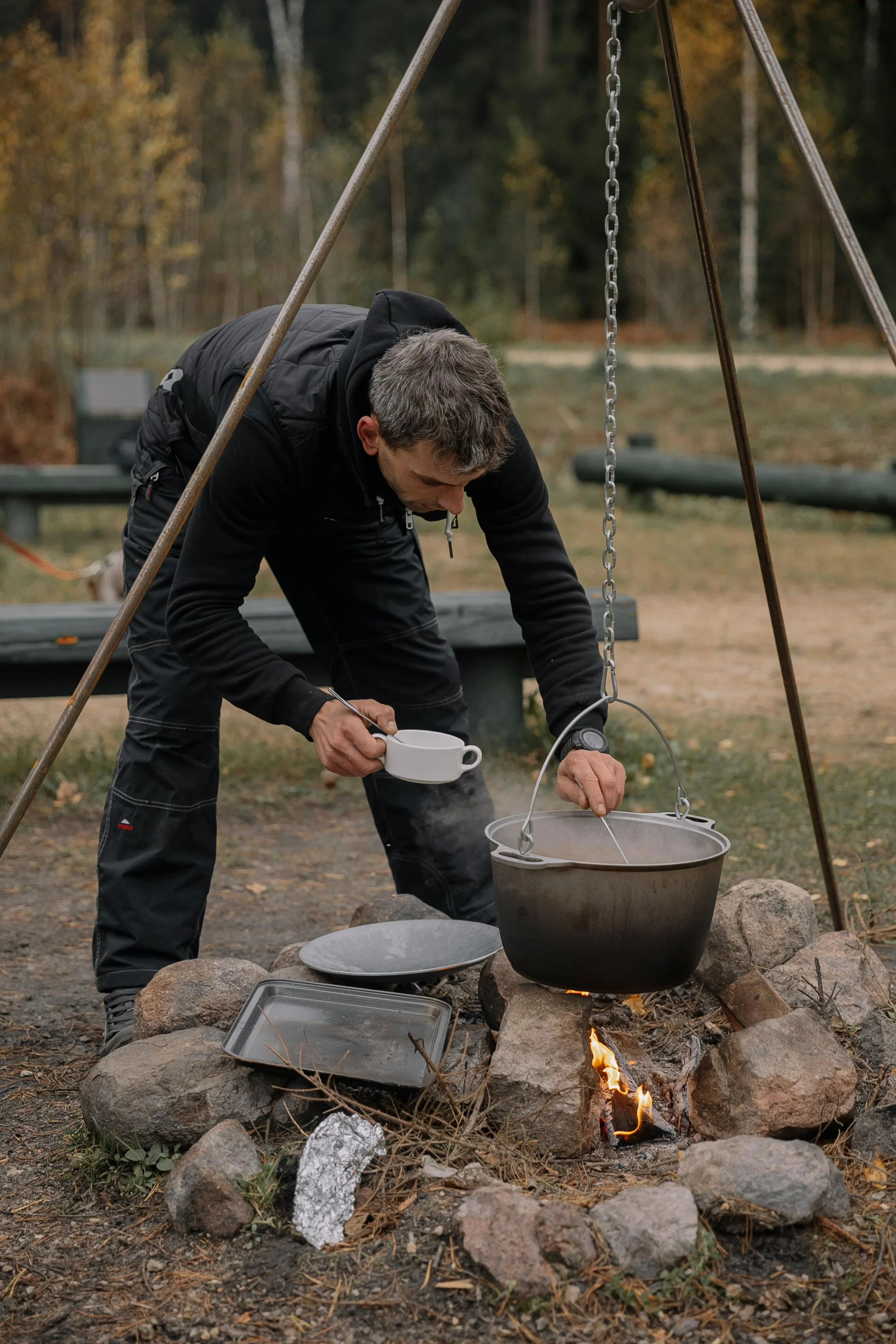 Man camping and cooking food