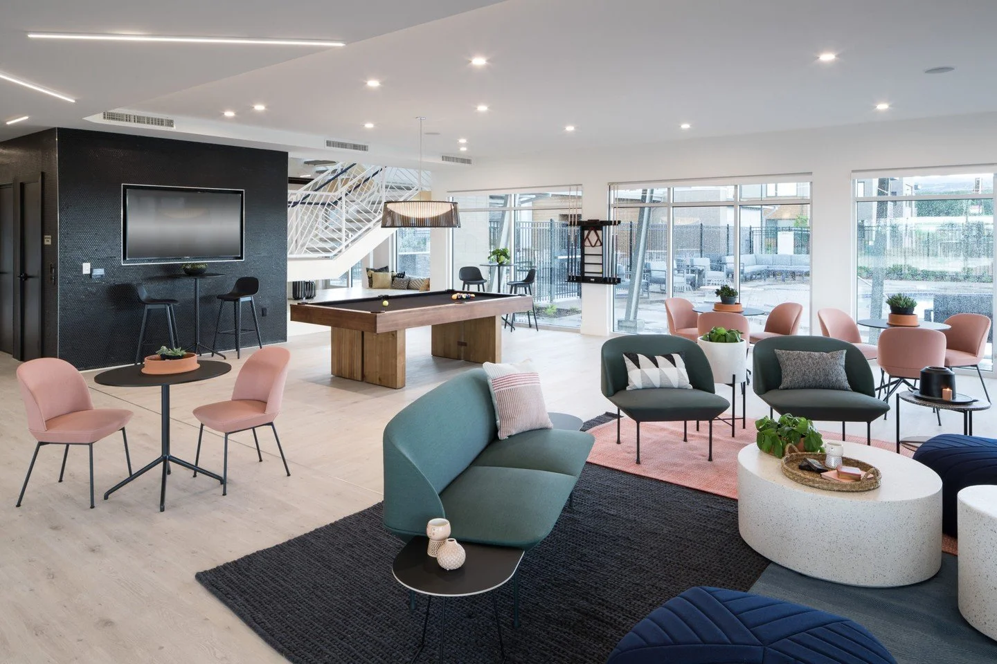 With spectacular mountain views, this multifamily development with Trammell Crow Residential boasts a vibrant and playful interior filled with color, pattern, and texture.

#interiordesign #tile #clubhouse