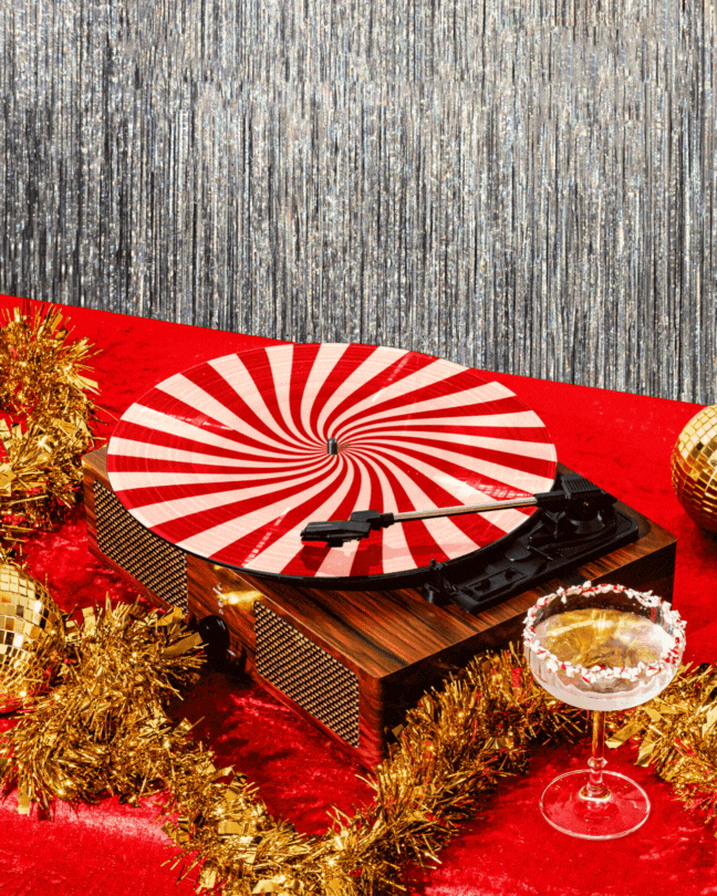 peppermint vinyl record with tinsel background.gif