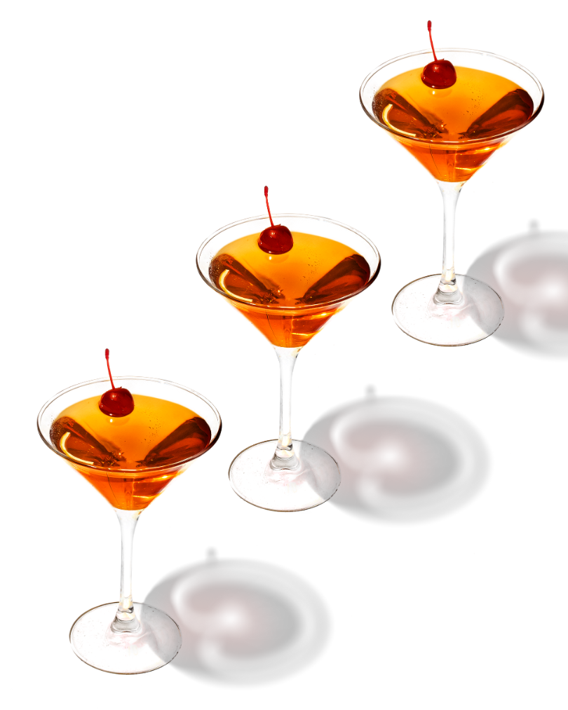 Photo of three Manhattan cocktails aligned diagonally