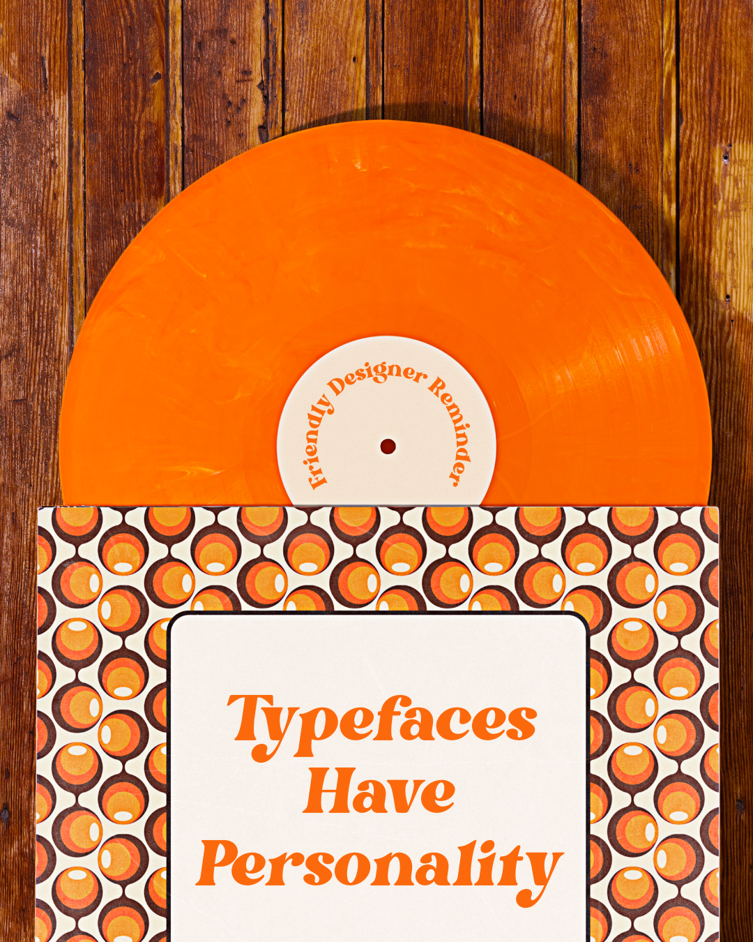 an image of a vinyl record in a 1970s style on a wood panel background that says "typefaces have personality"
